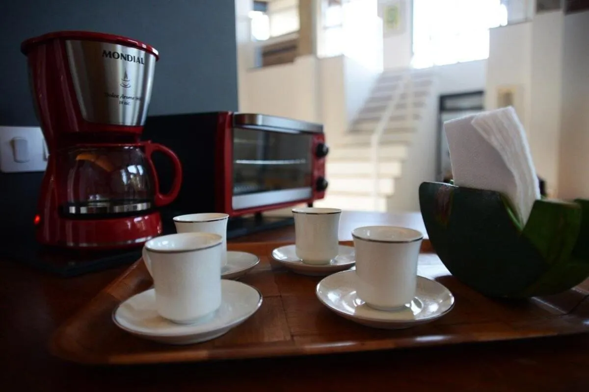 Kitchen or kitchenette in Casa de arquiteto com vista, jardim e lareira
