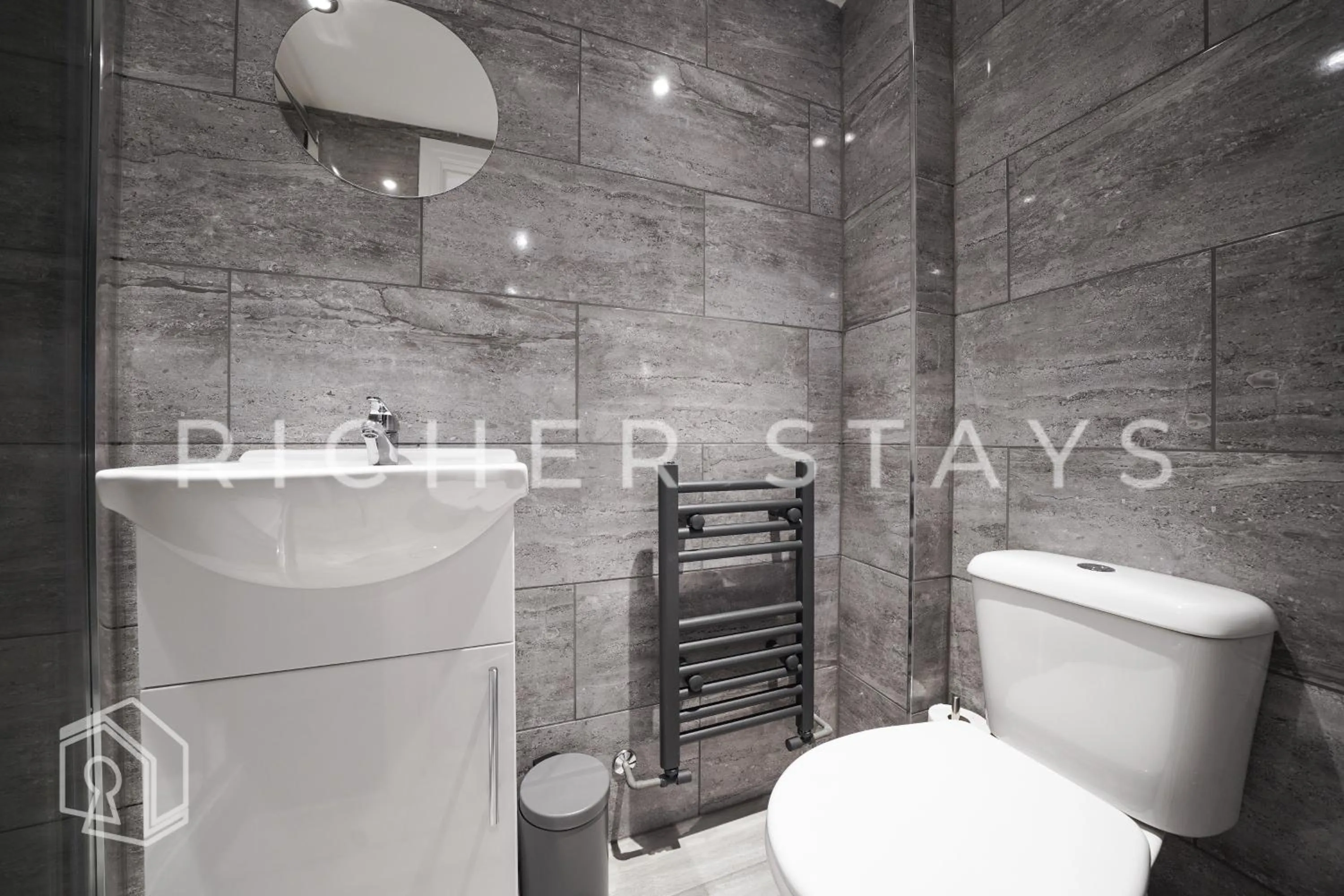 Shower in Hackney Suites - En-suite rooms & amenities