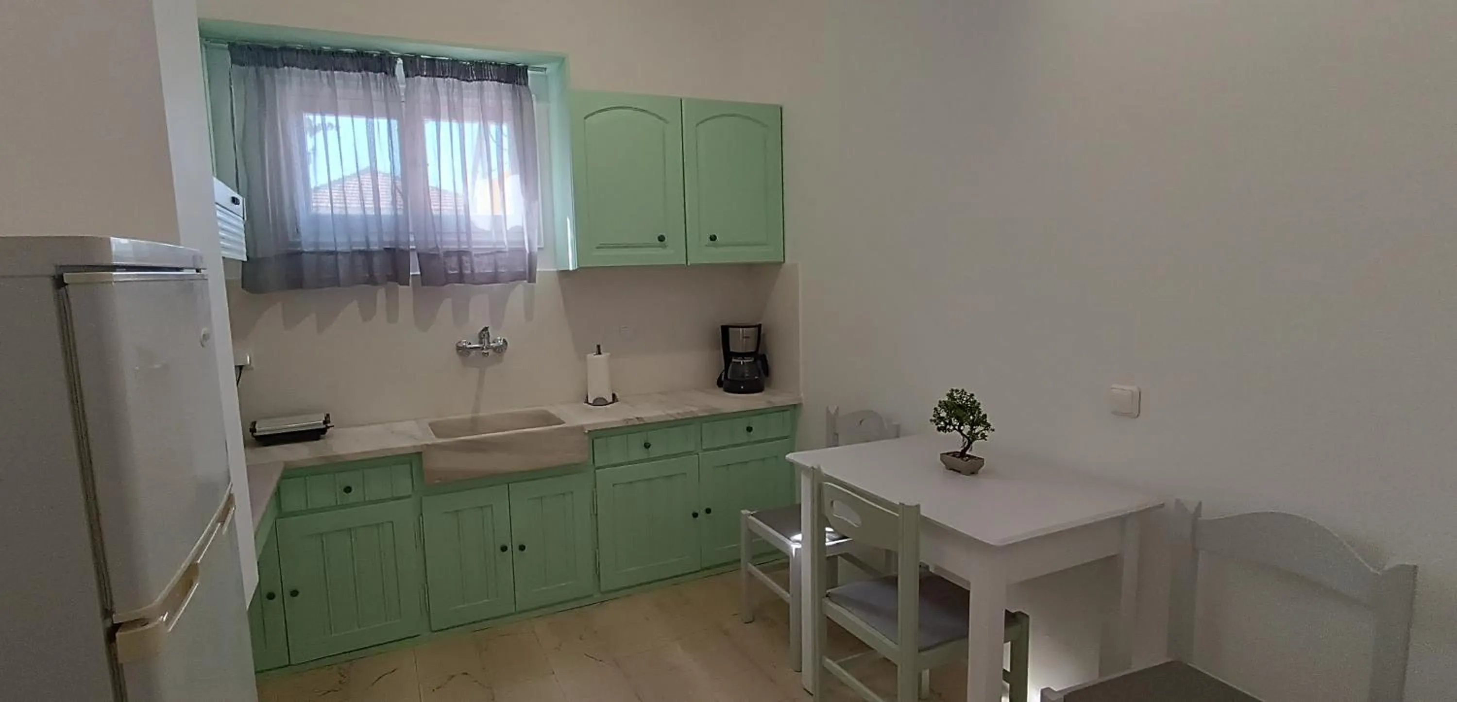 Kitchen or kitchenette in IL MIRTO VERDE