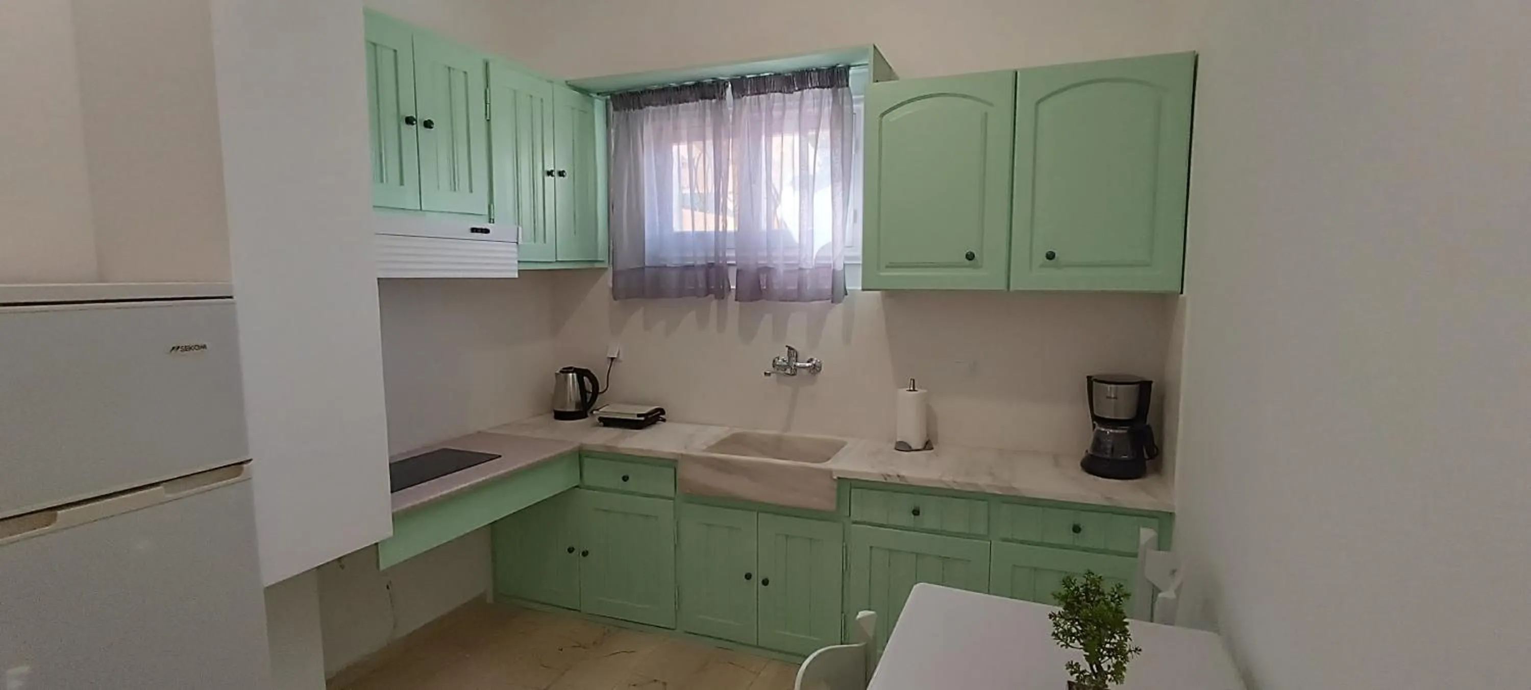 Kitchen or kitchenette in IL MIRTO VERDE