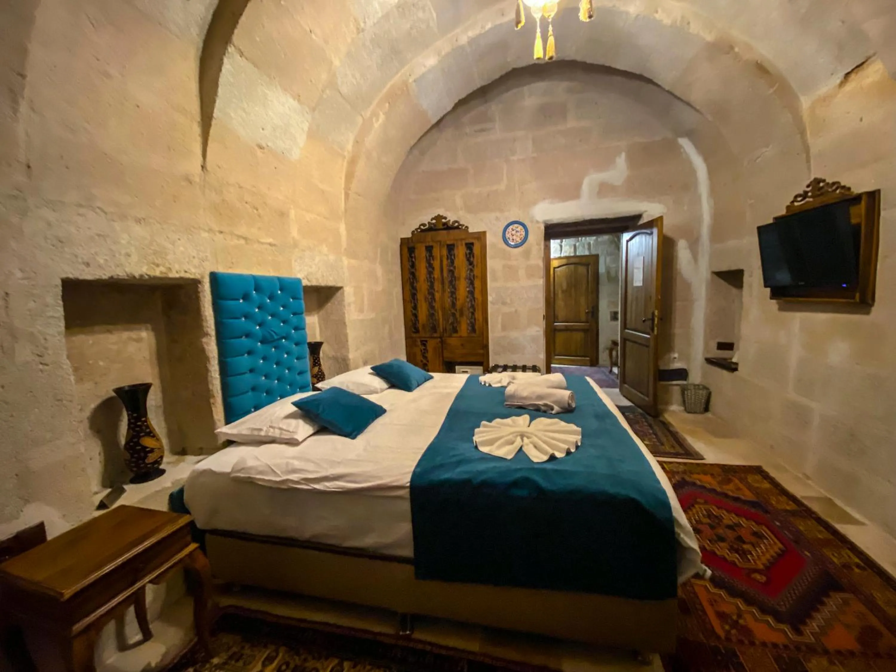 Bed in Milagre Cave Hotel