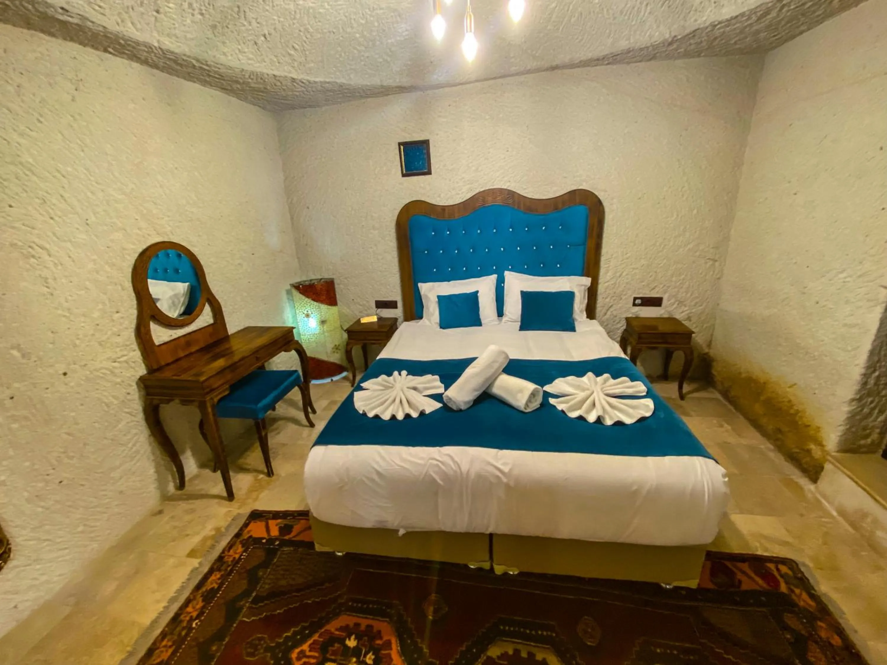 Bed in Milagre Cave Hotel