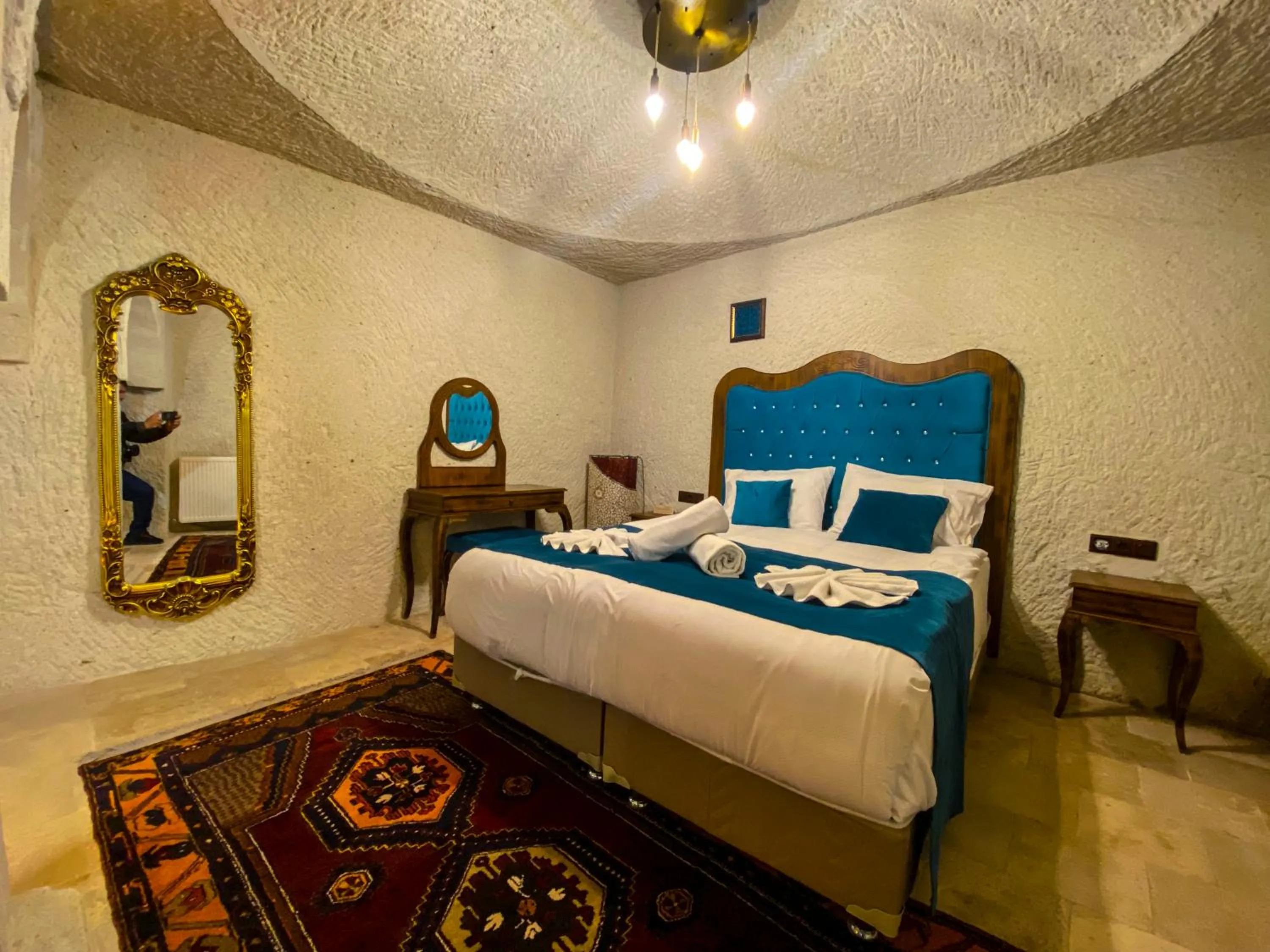 Bed in Milagre Cave Hotel