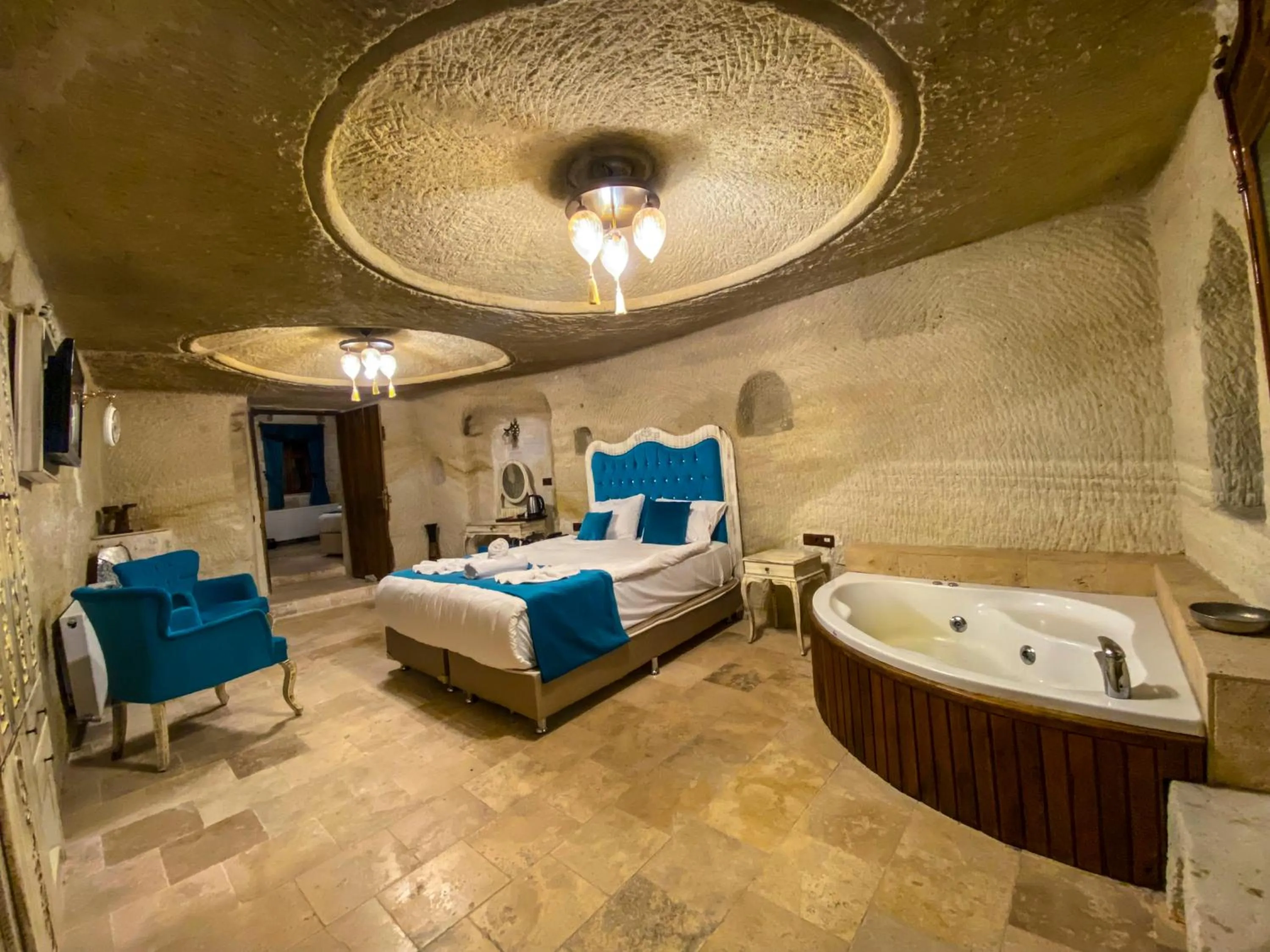 Bed in Milagre Cave Hotel