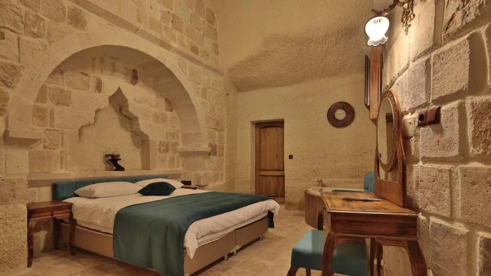 Bed in Milagre Cave Hotel