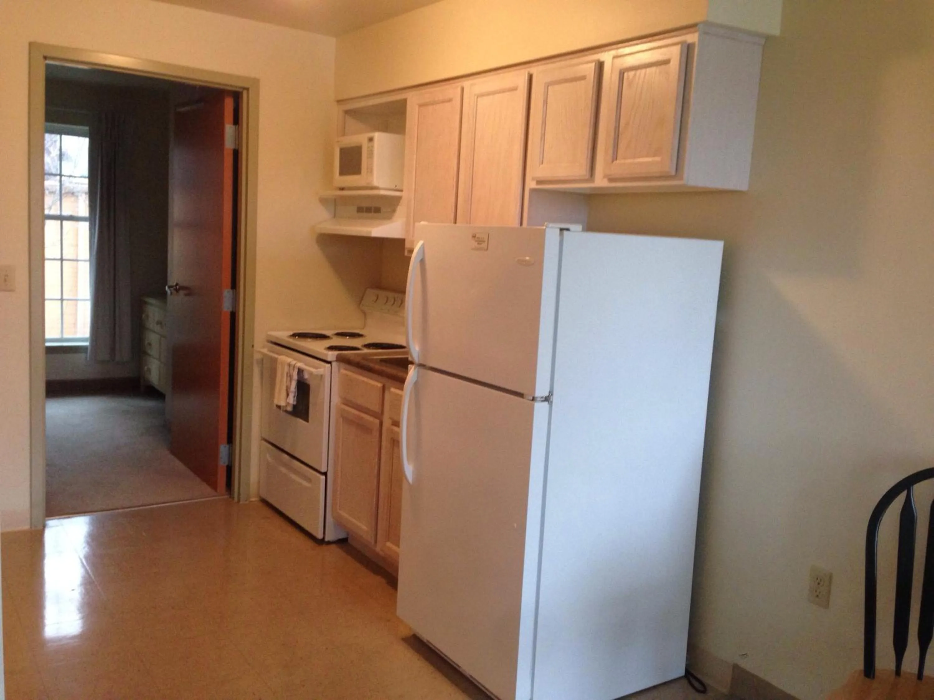 Kitchen or kitchenette in All Suites Inn Budget Host