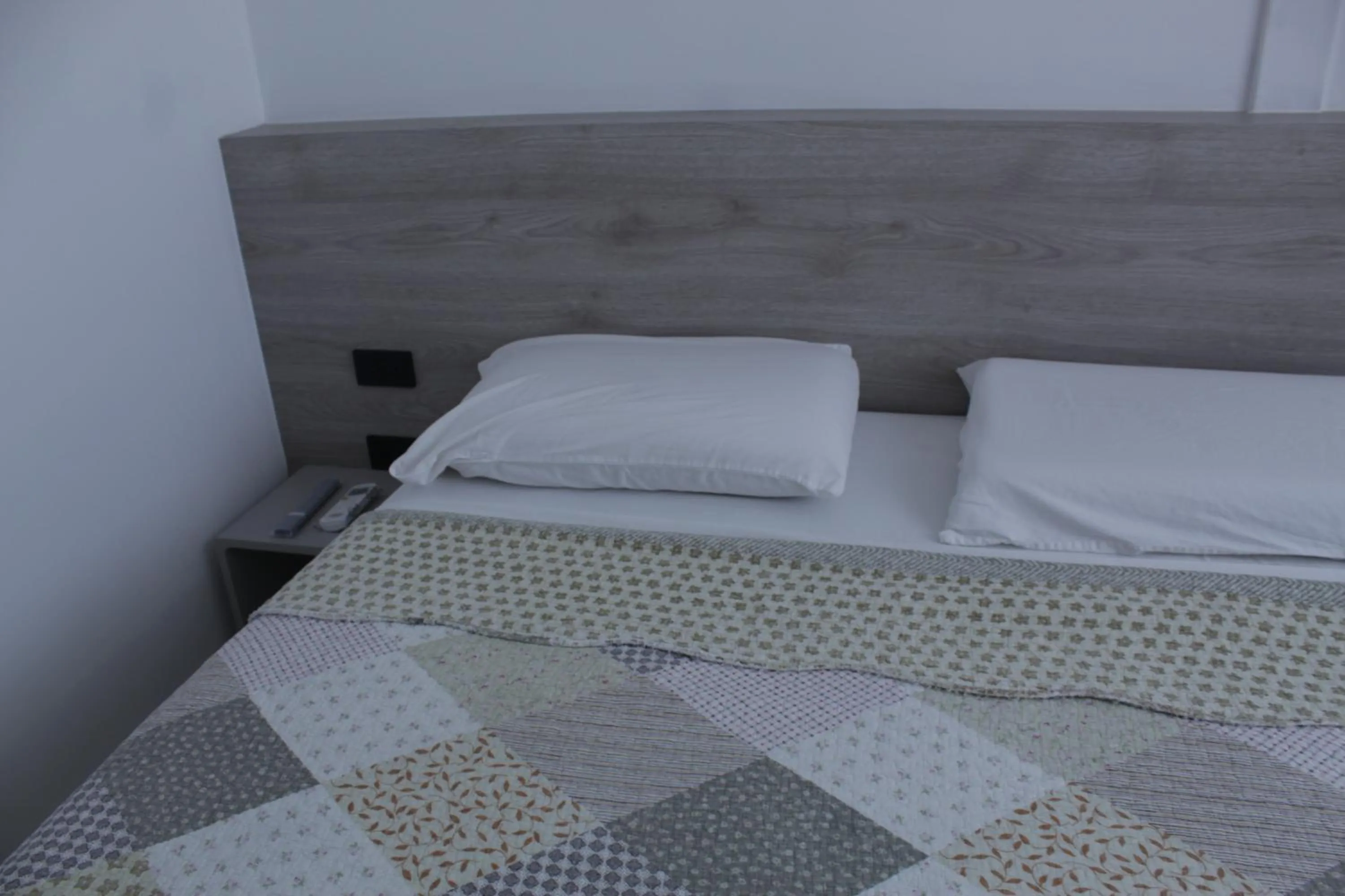 Bed in DC Suites Aeropuerto