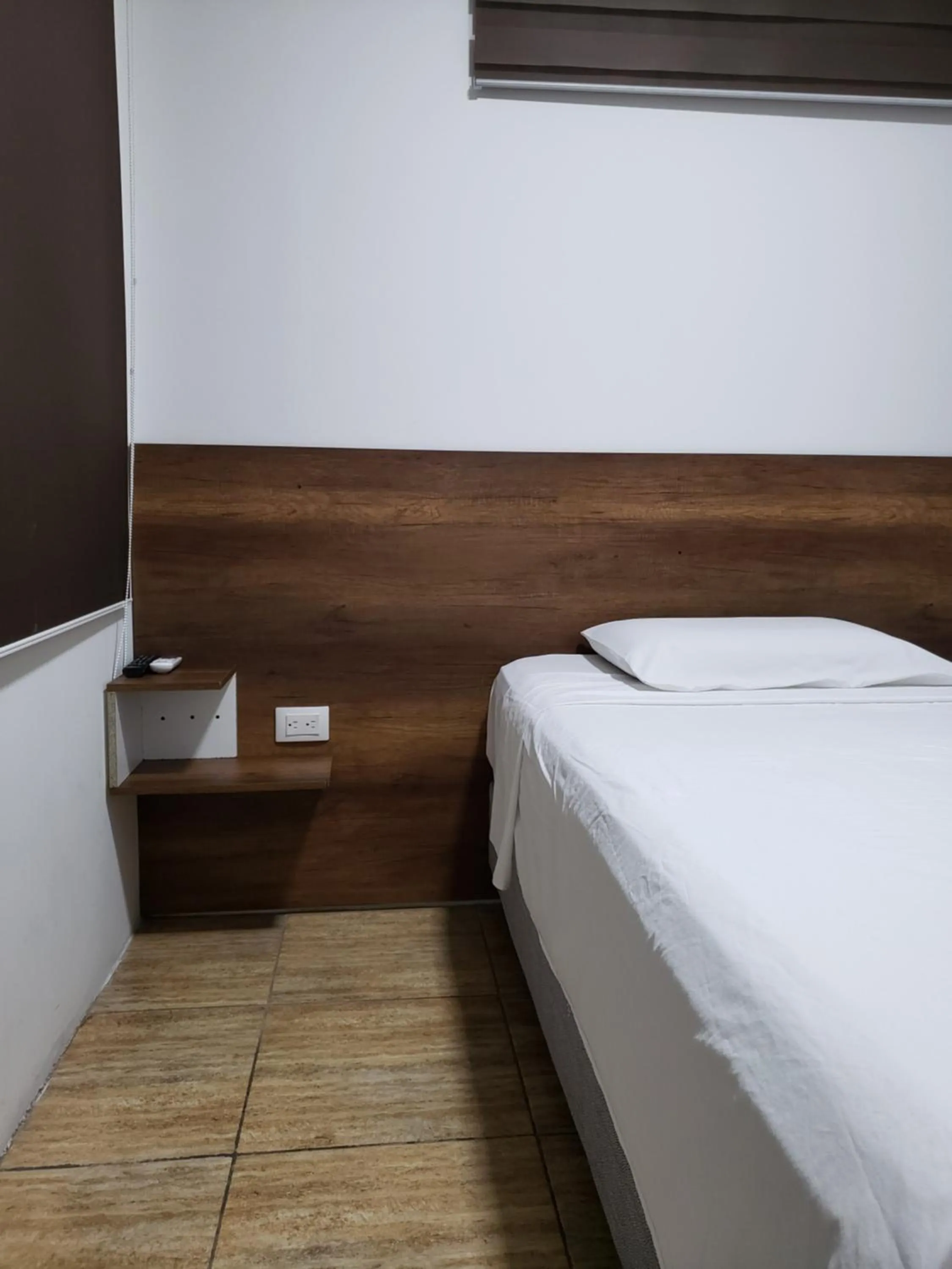 Bed in DC Suites Aeropuerto