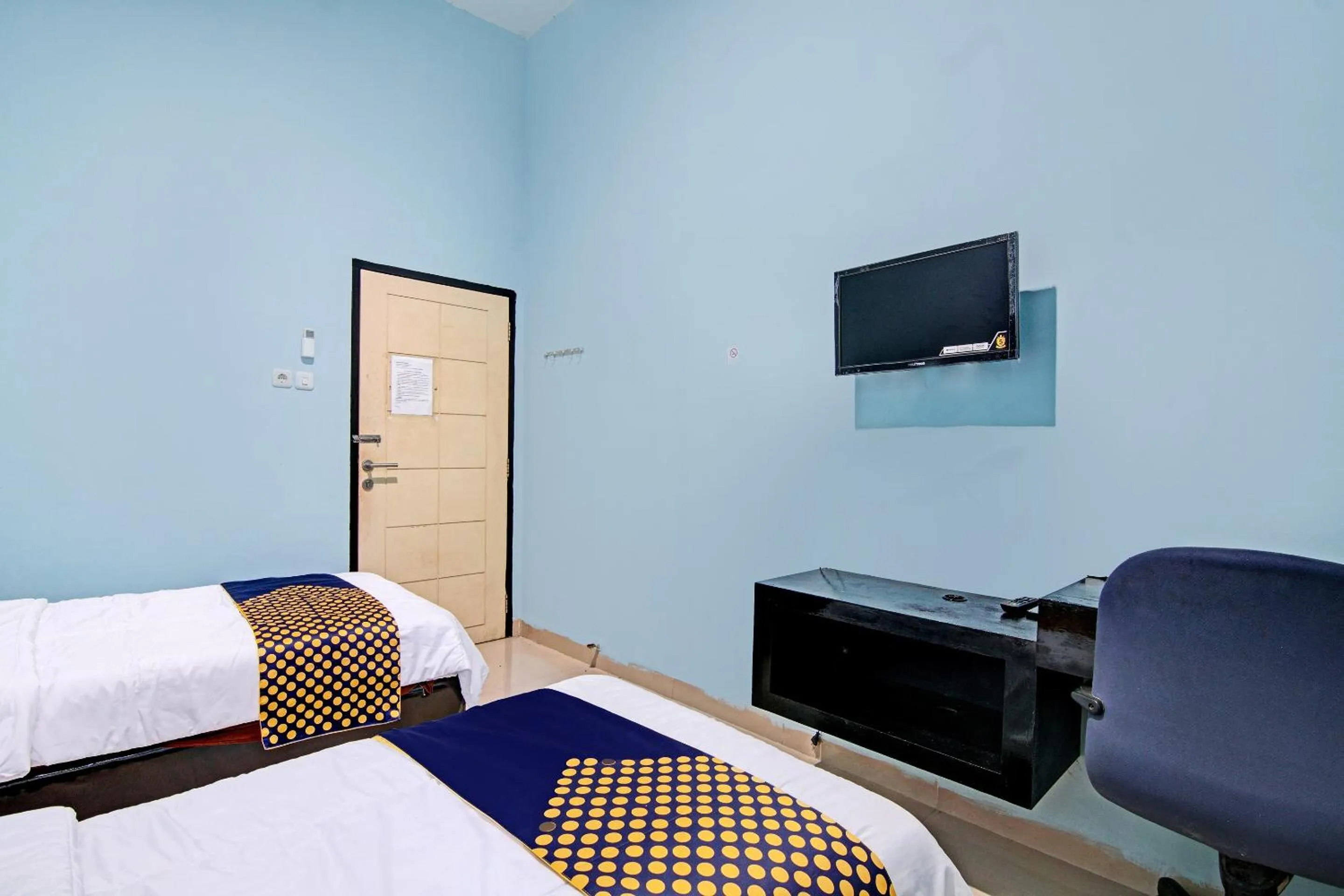 Bedroom, Bed in Hotel O Penginapan Puti SyariahNearBandara Sultan Syarif Kasim II