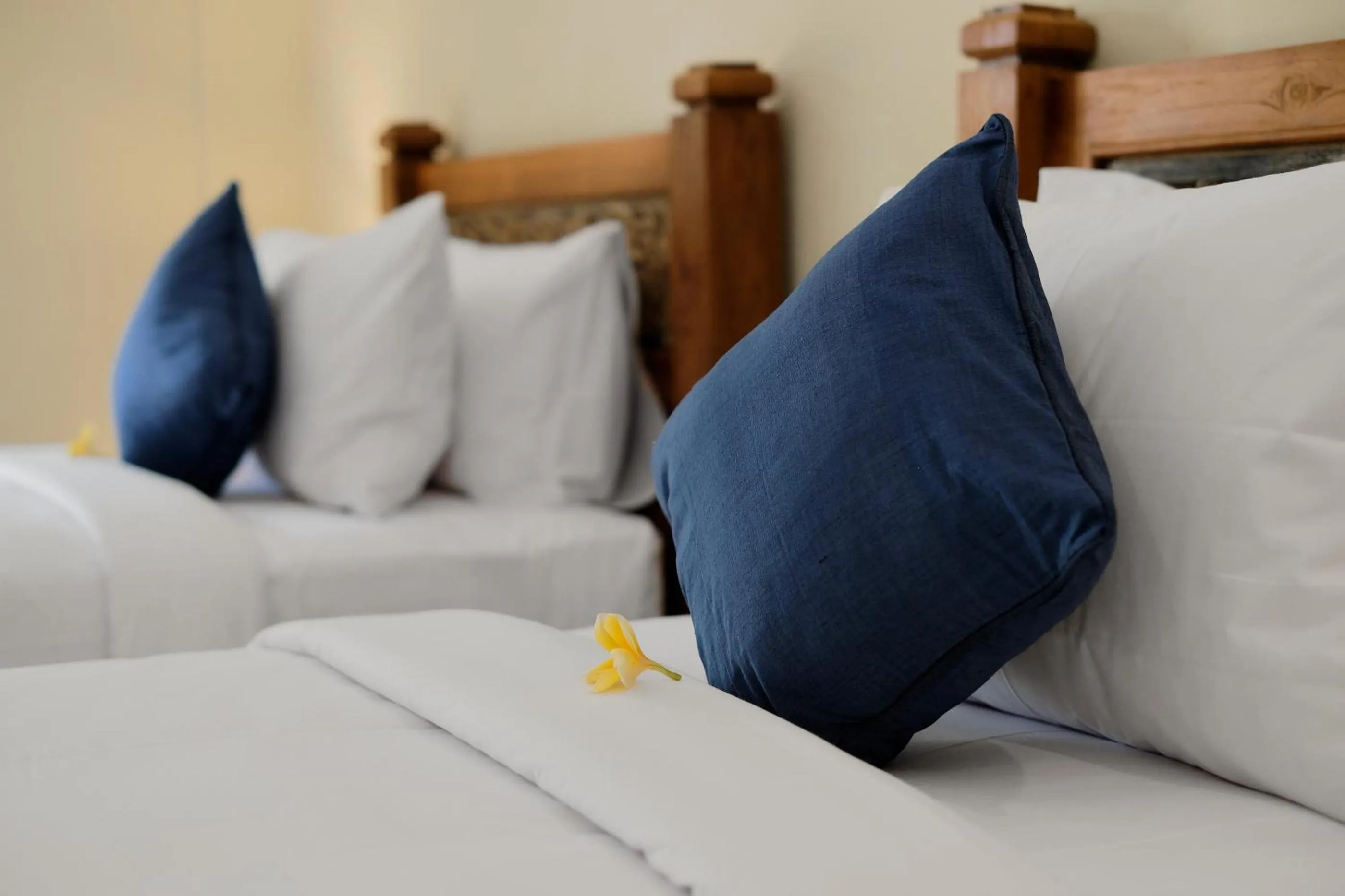 Bed in Tigata Ubud Cottage