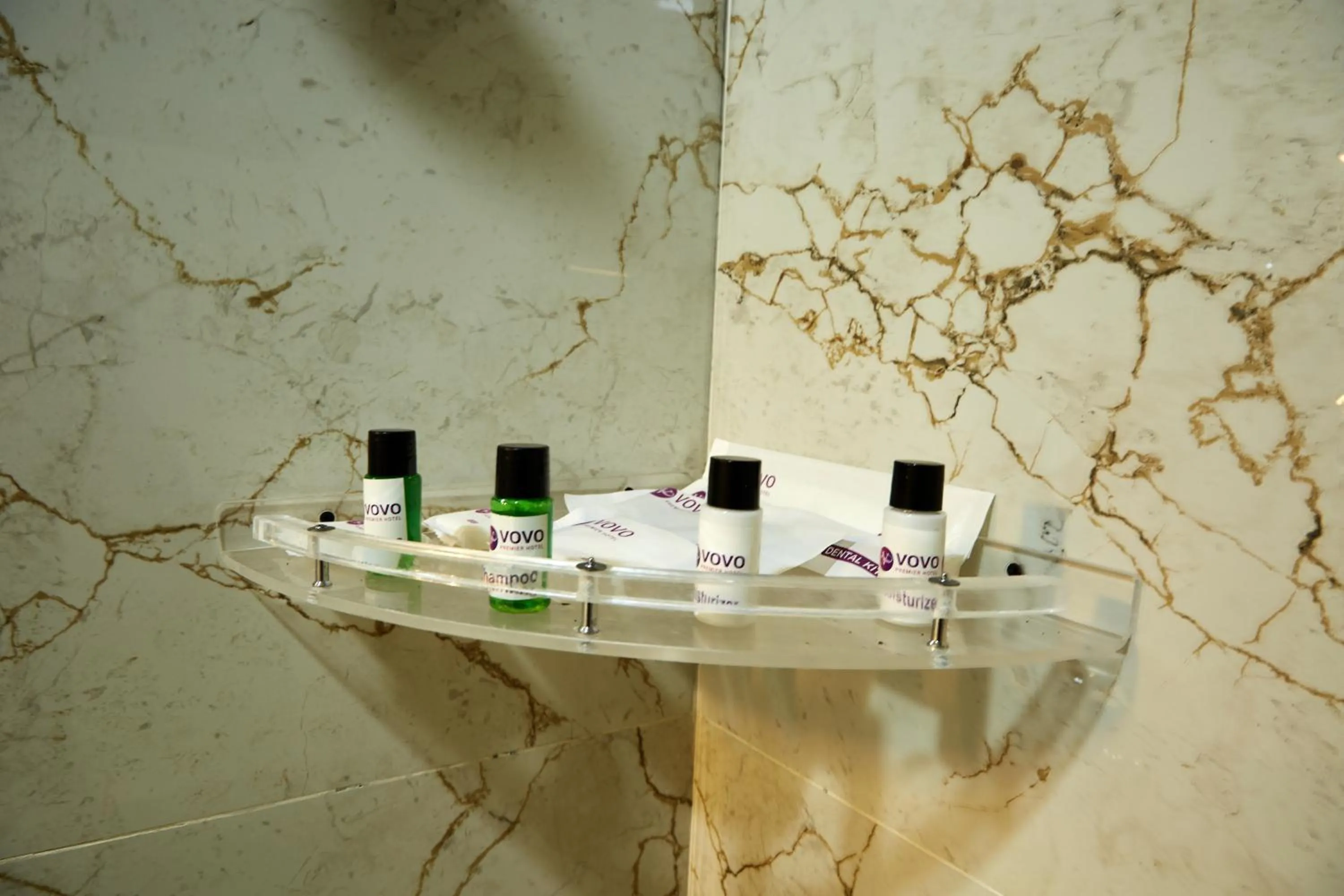 Toilet in VOVO PREMIER HOTEL