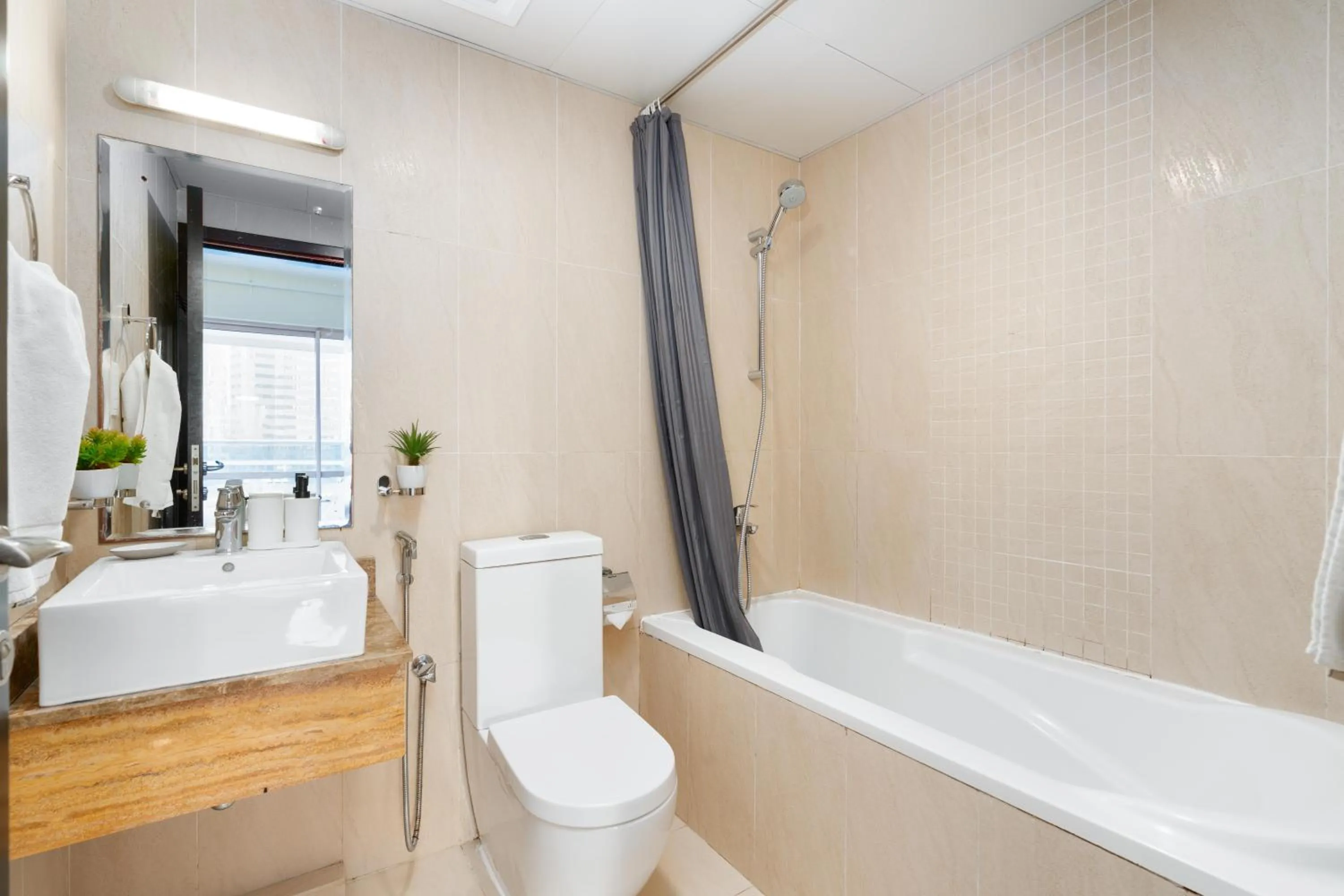 Bathroom in White Sage - Gorgeous Apartment in JLT Near the Metro Station
