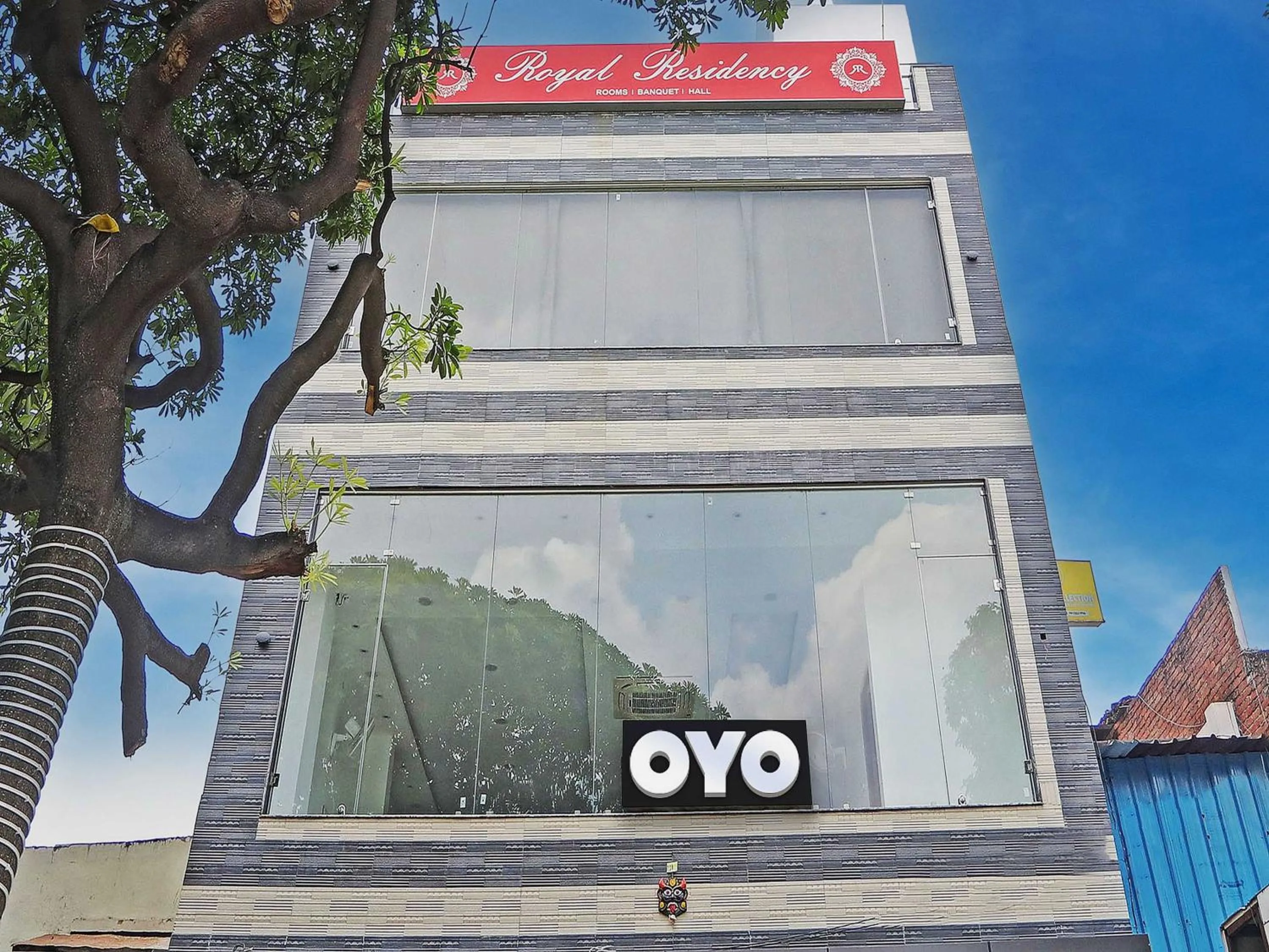 Facade/entrance in Hotel O by OYO Royal Residency