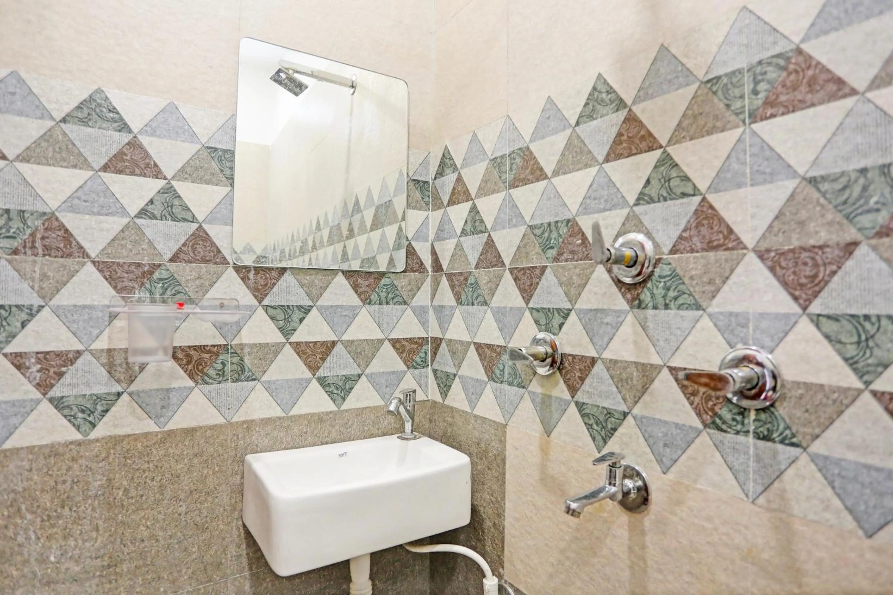 Bathroom in Hotel O by OYO Royal Residency