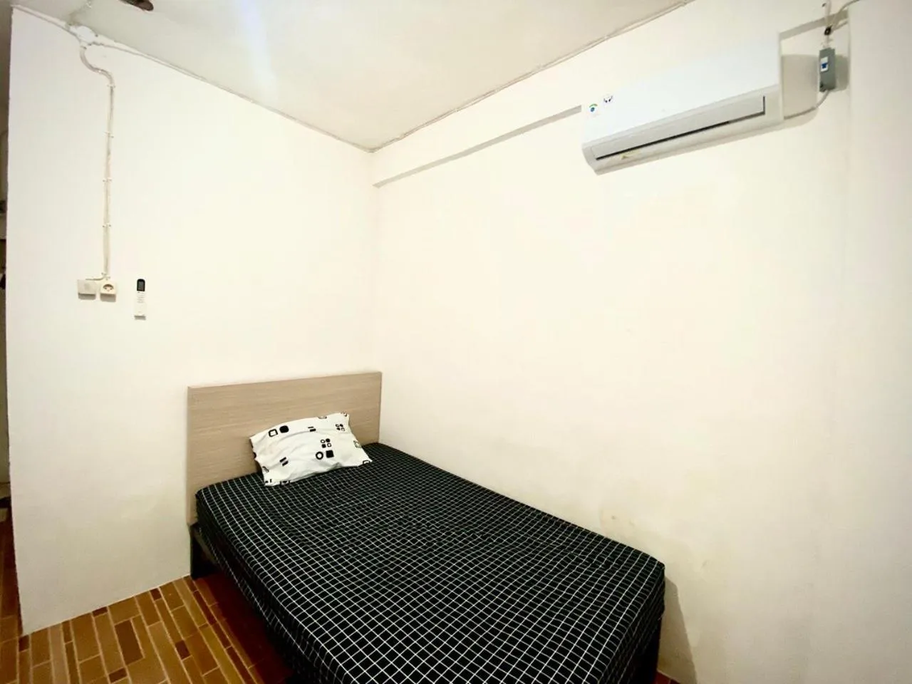 Bed in Kasmarani Homestay