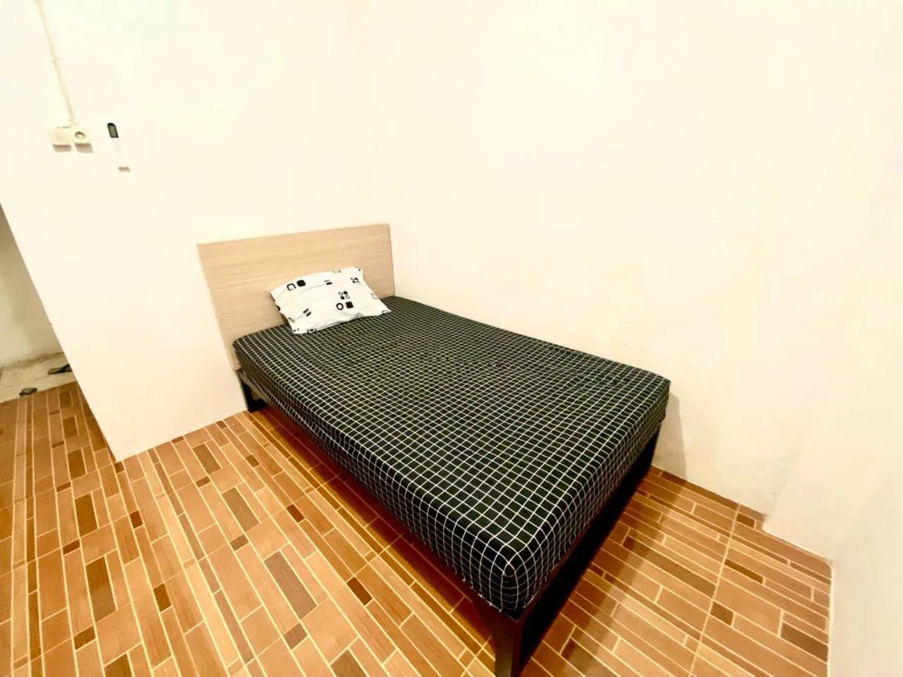 Bed in Kasmarani Homestay
