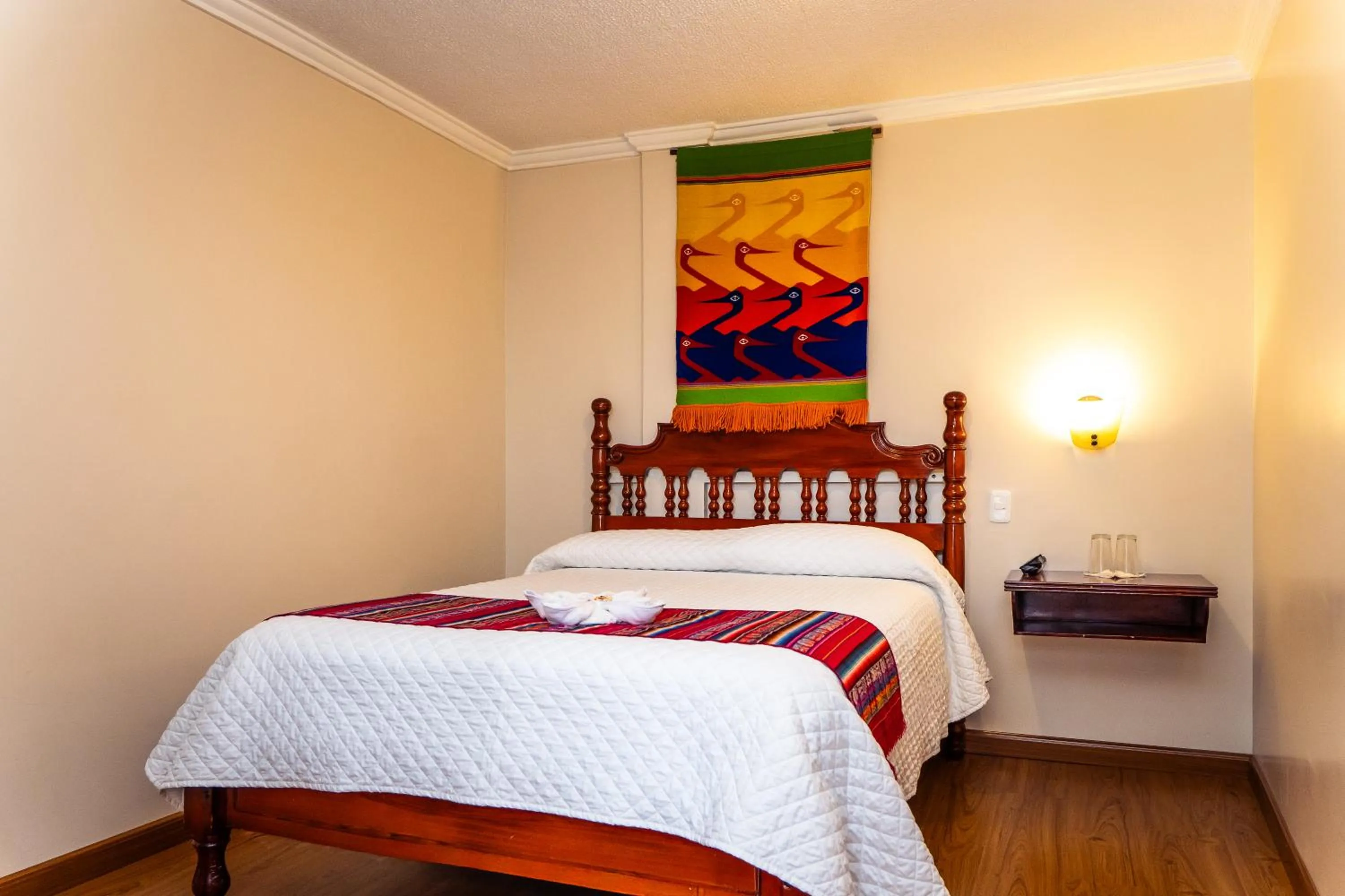 Bed in Hotel El Indio Inn