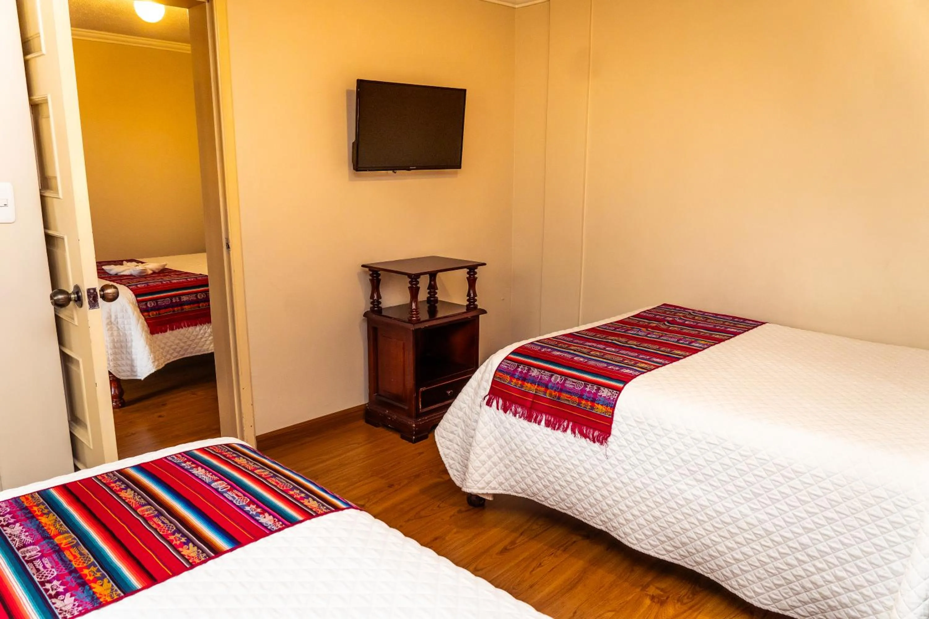 Bed in Hotel El Indio Inn