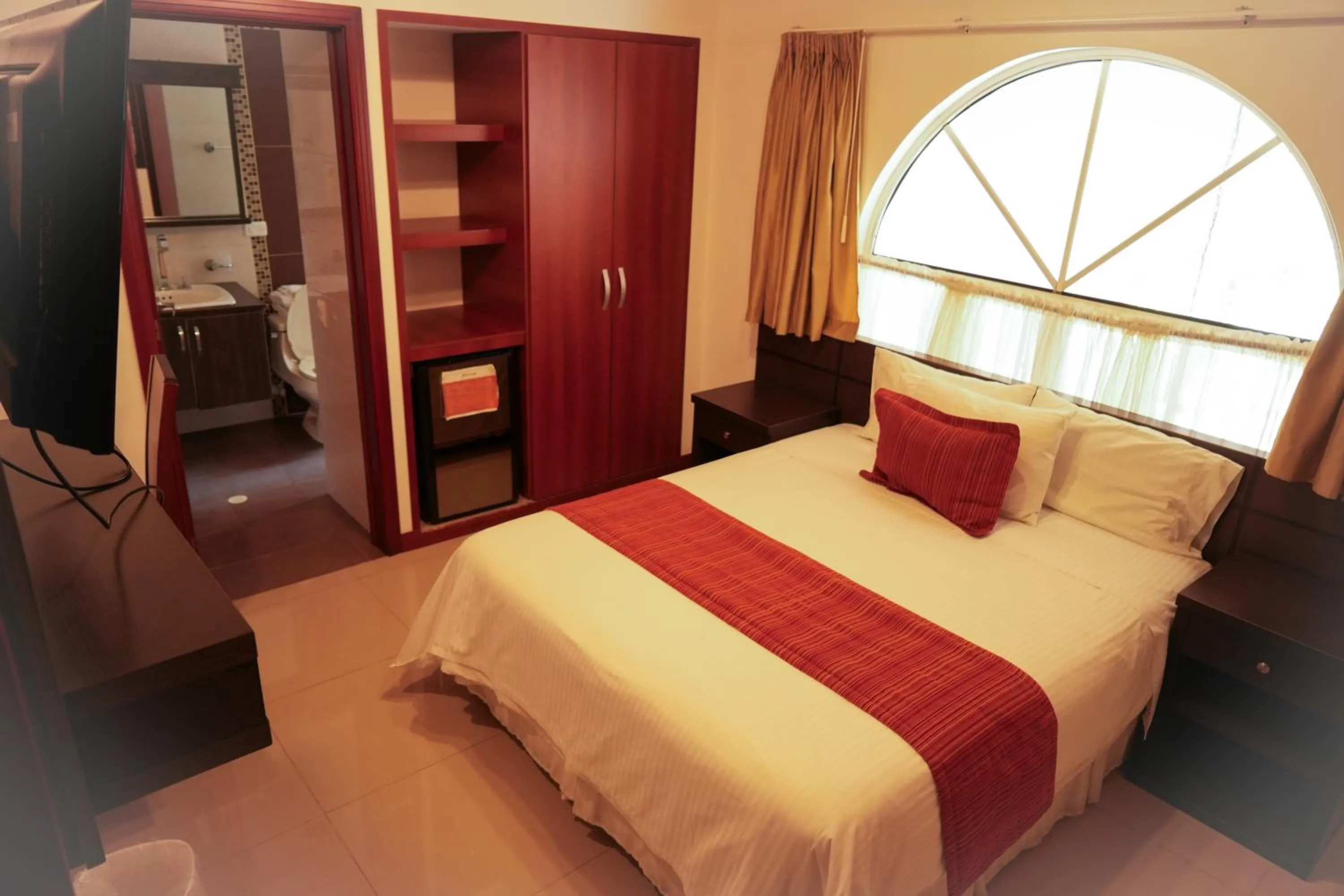 Bed in Serenity Suites Casa Boutique