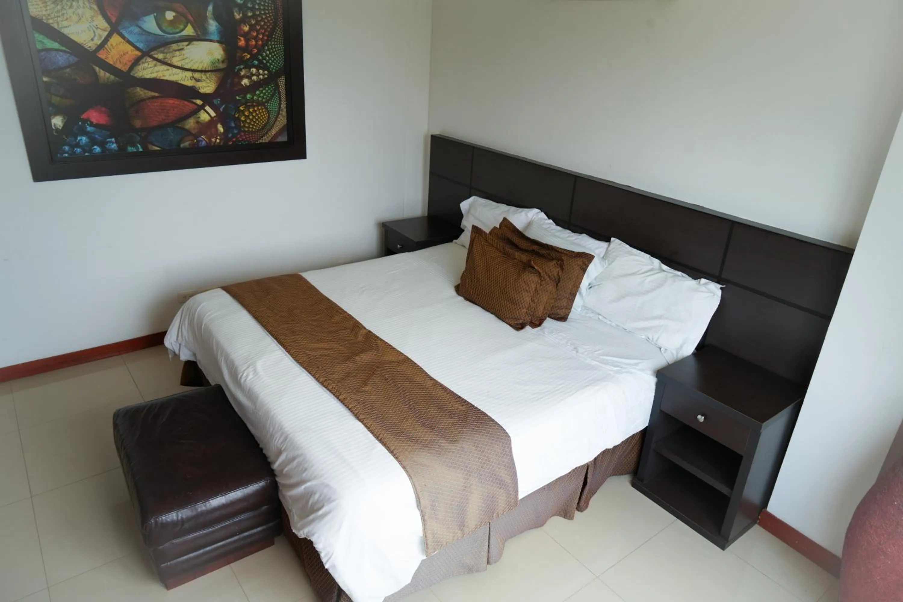 Bed in Serenity Suites Casa Boutique