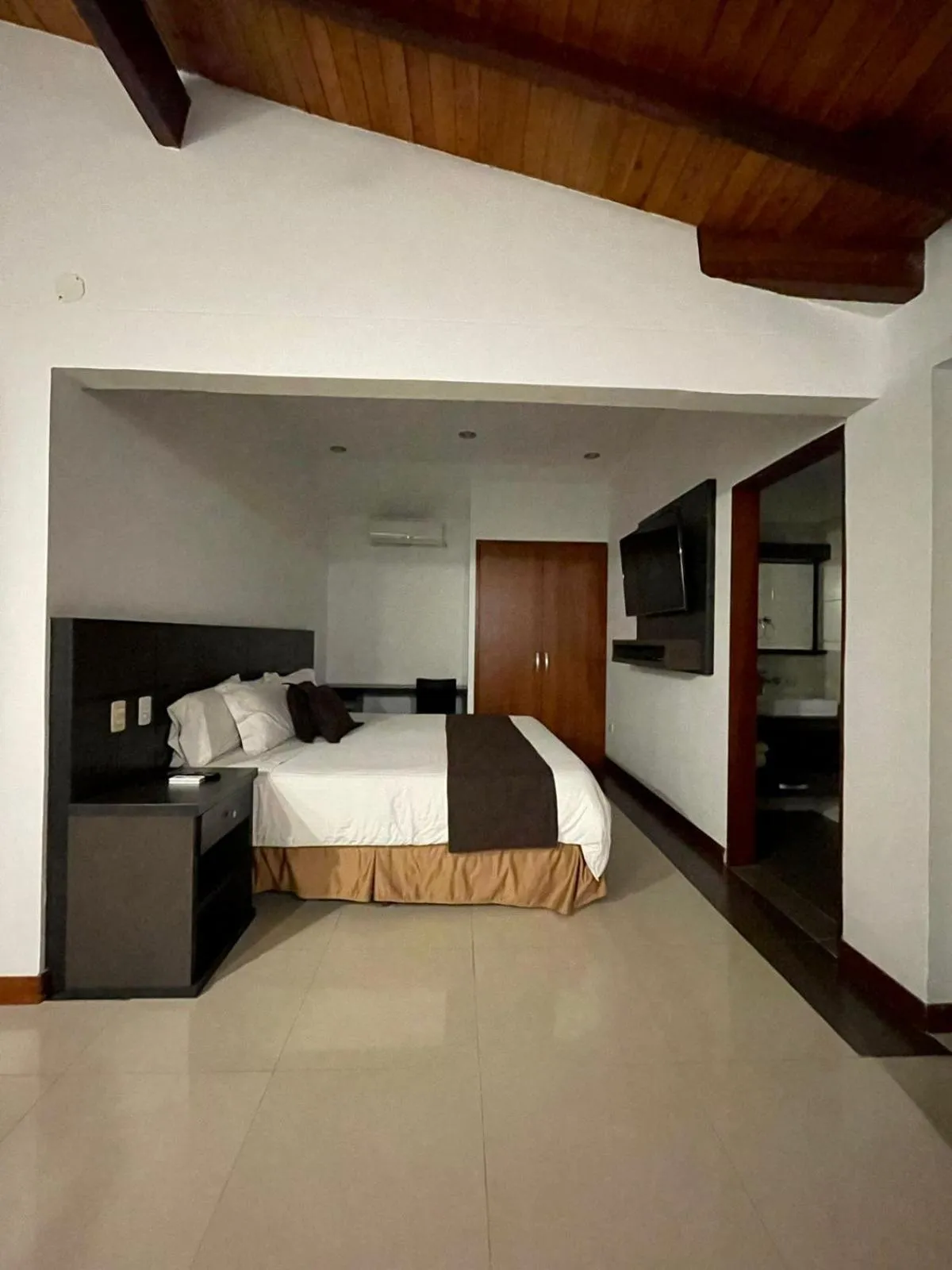 Bed in Serenity Suites Casa Boutique