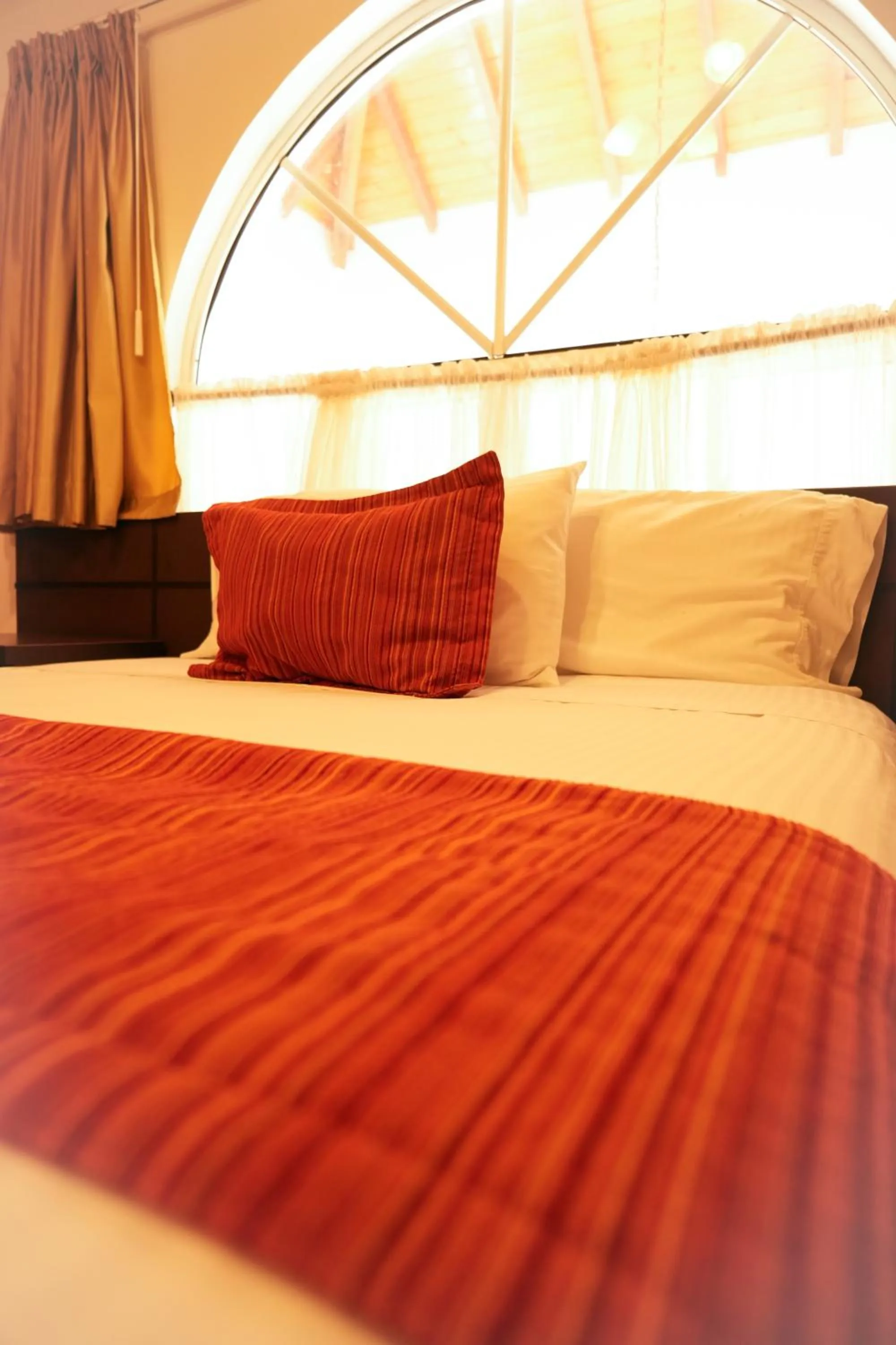 Bed in Serenity Suites Casa Boutique