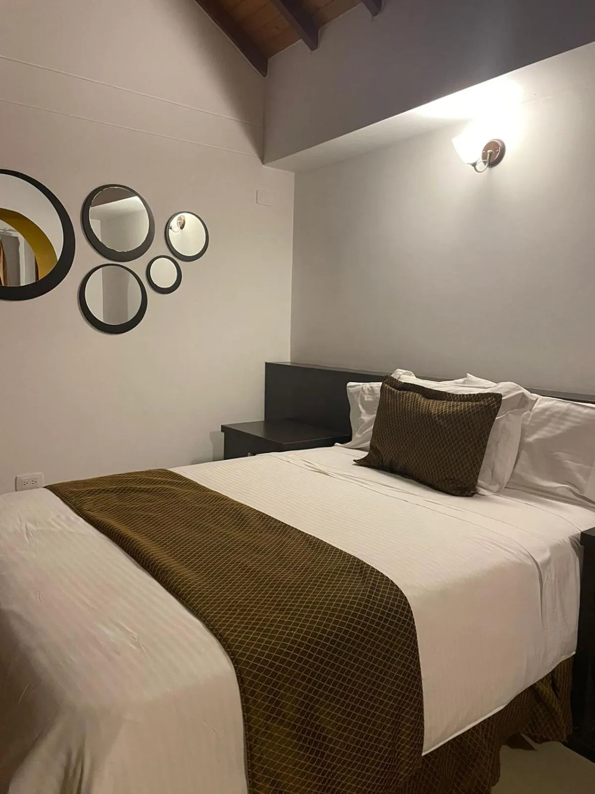 Bed in Serenity Suites Casa Boutique