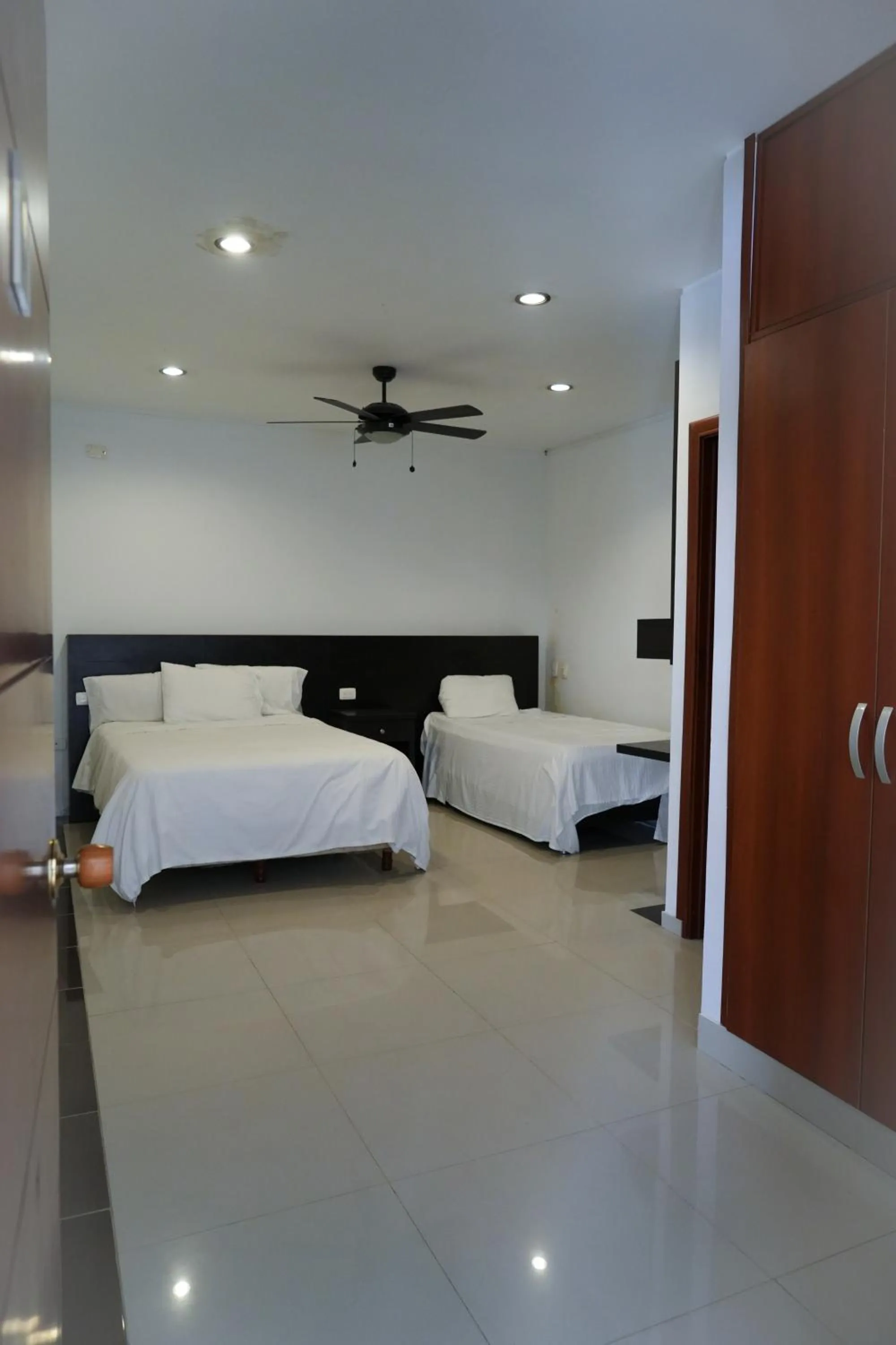 Bed in Serenity Suites Casa Boutique