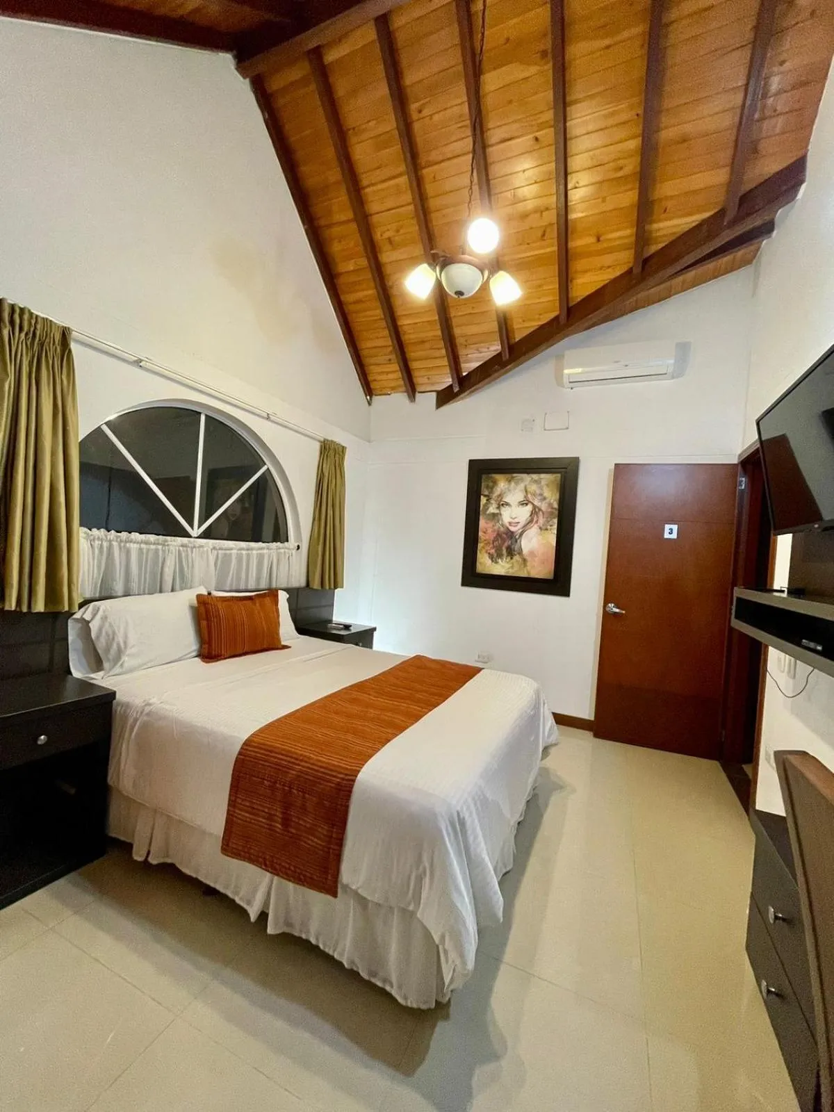 Bed in Serenity Suites Casa Boutique