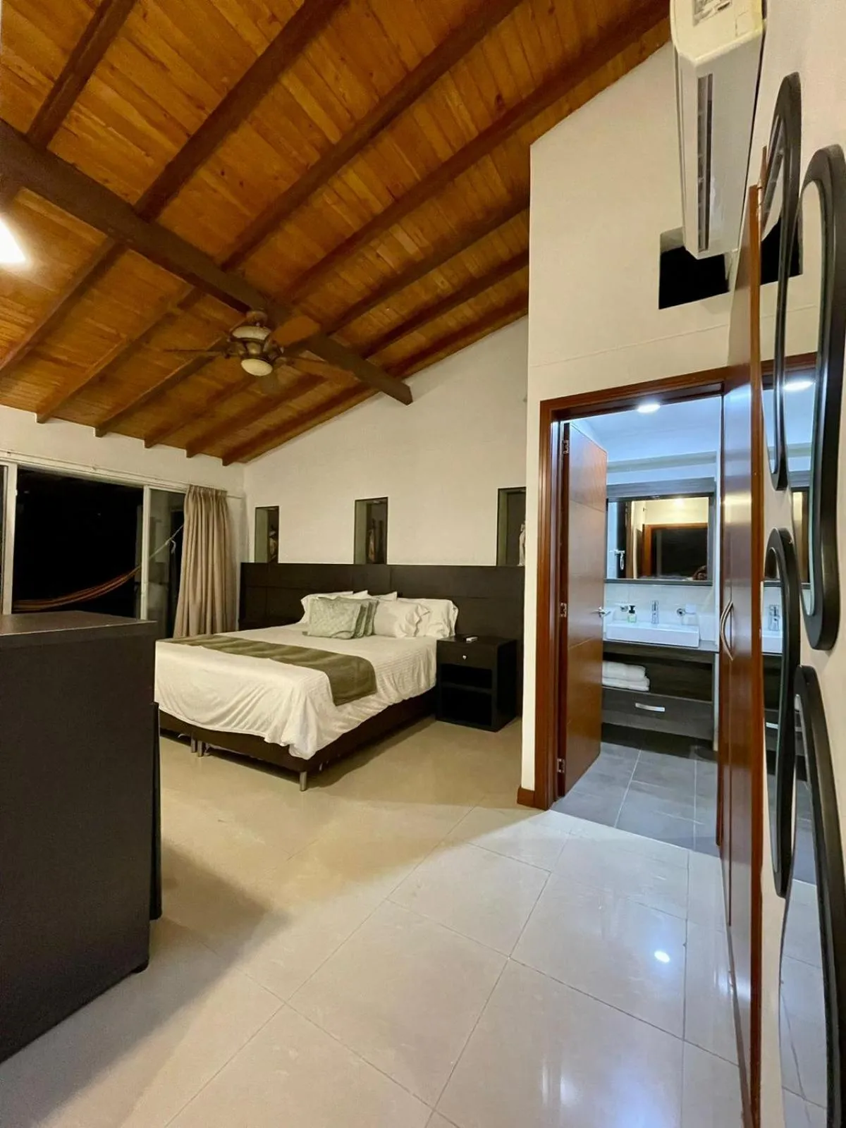 Bed in Serenity Suites Casa Boutique