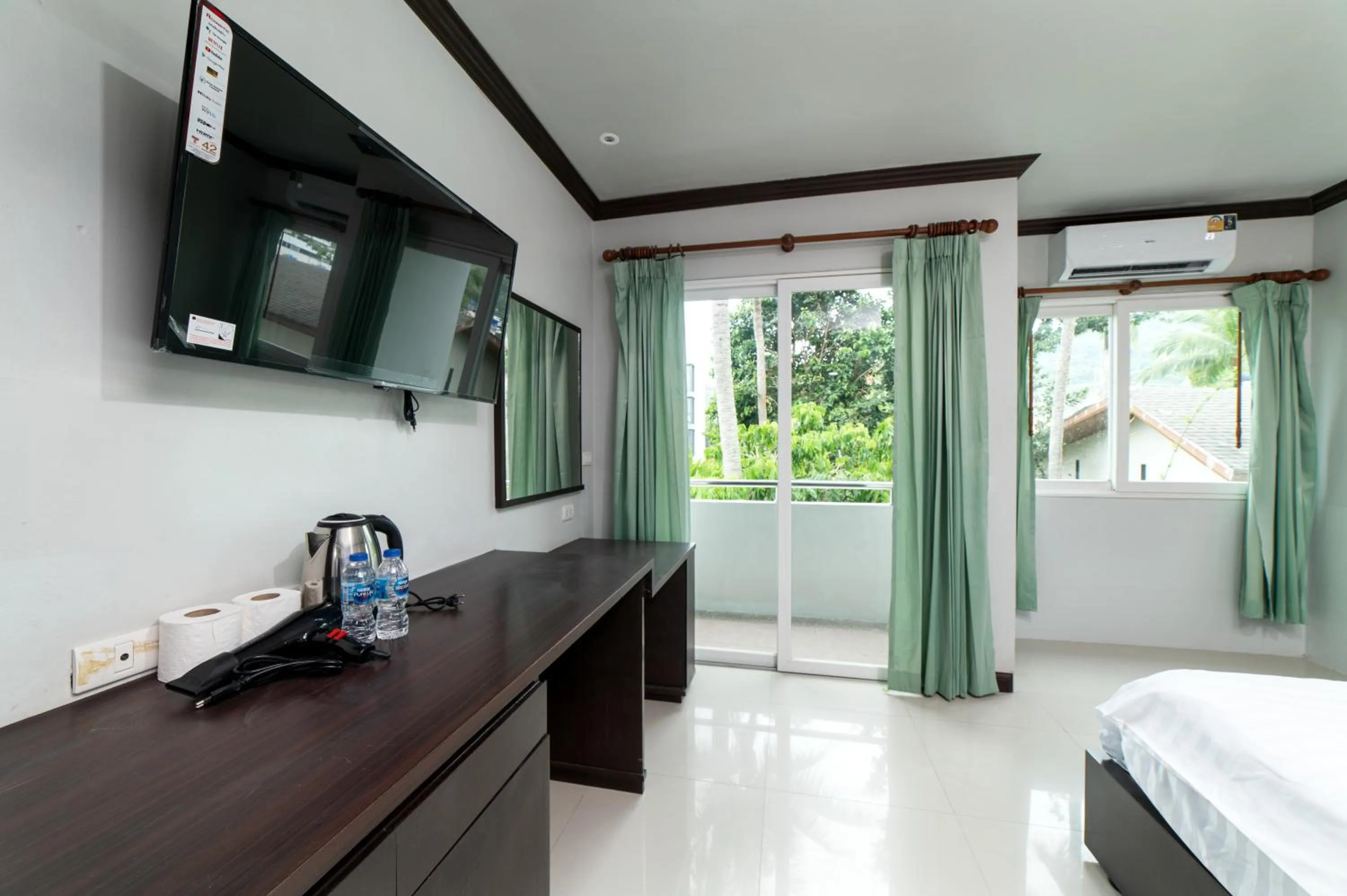 TV and multimedia, Bed in GP House Phuket Patong Beach