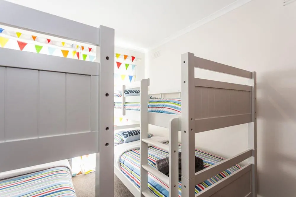 Bed in Torquay Retreats Aus- TwentyTwo Pride