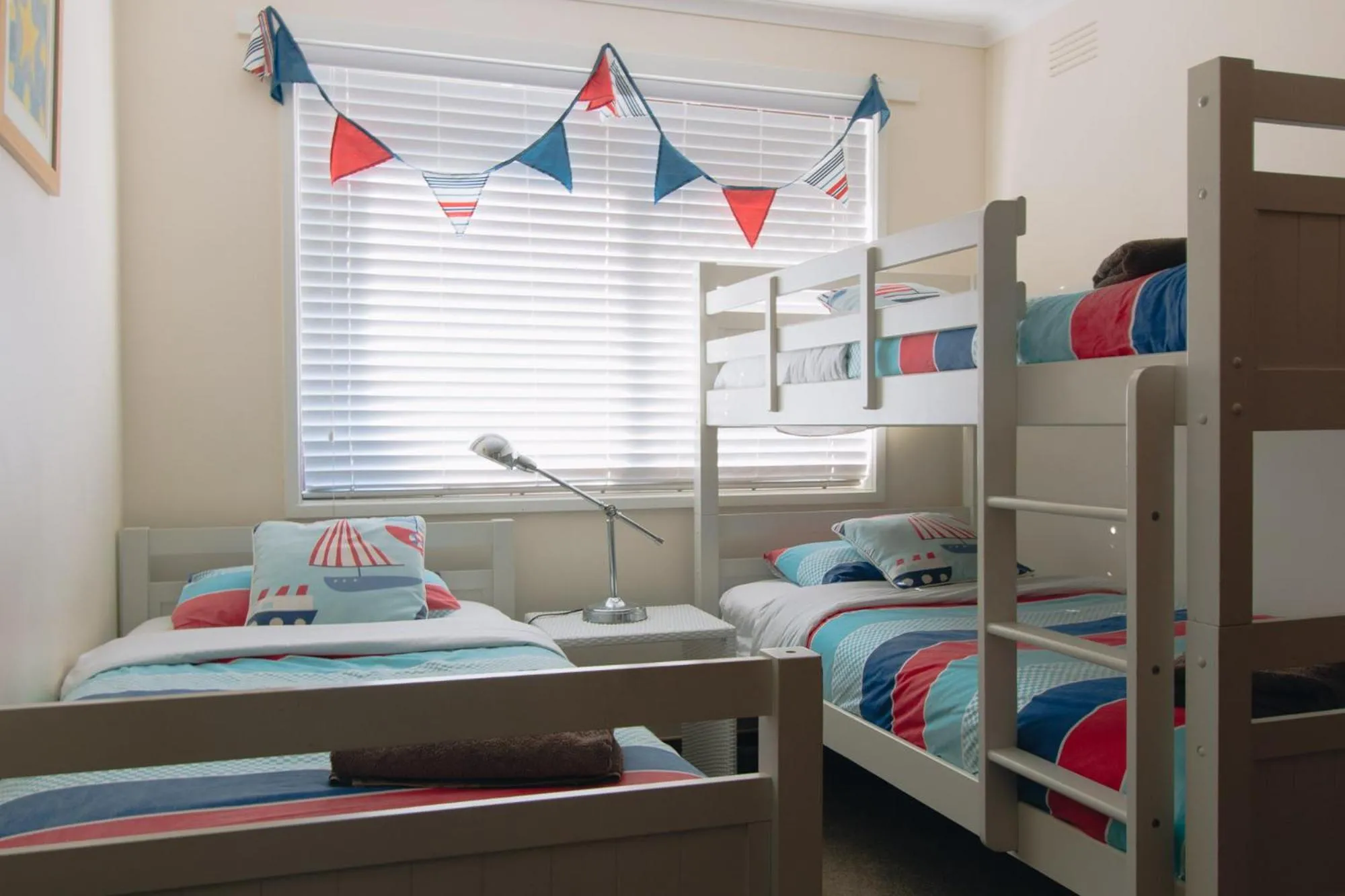 Bed in Torquay Retreats Aus- TwentyTwo Pride