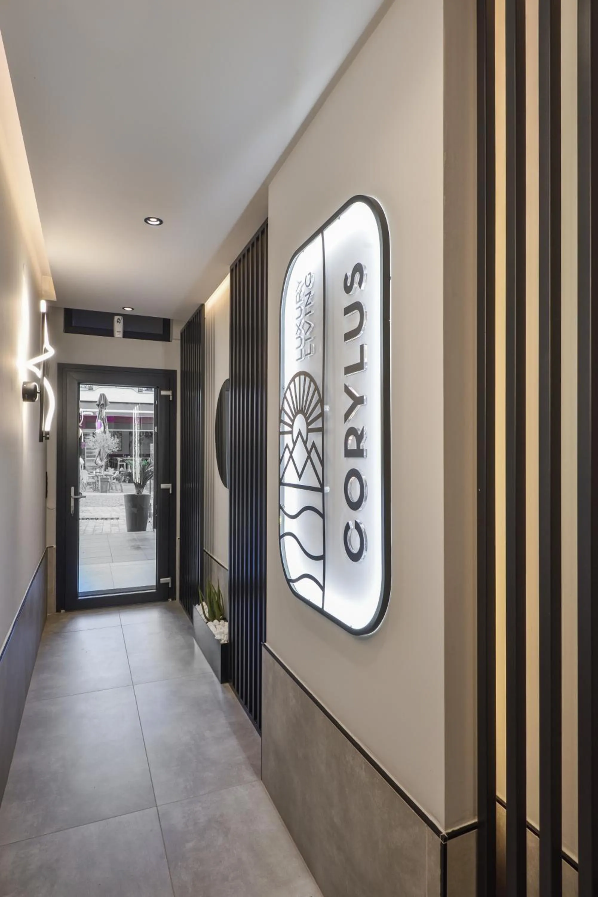 Property logo or sign in CORYLUS Luxury Rooms & Suites