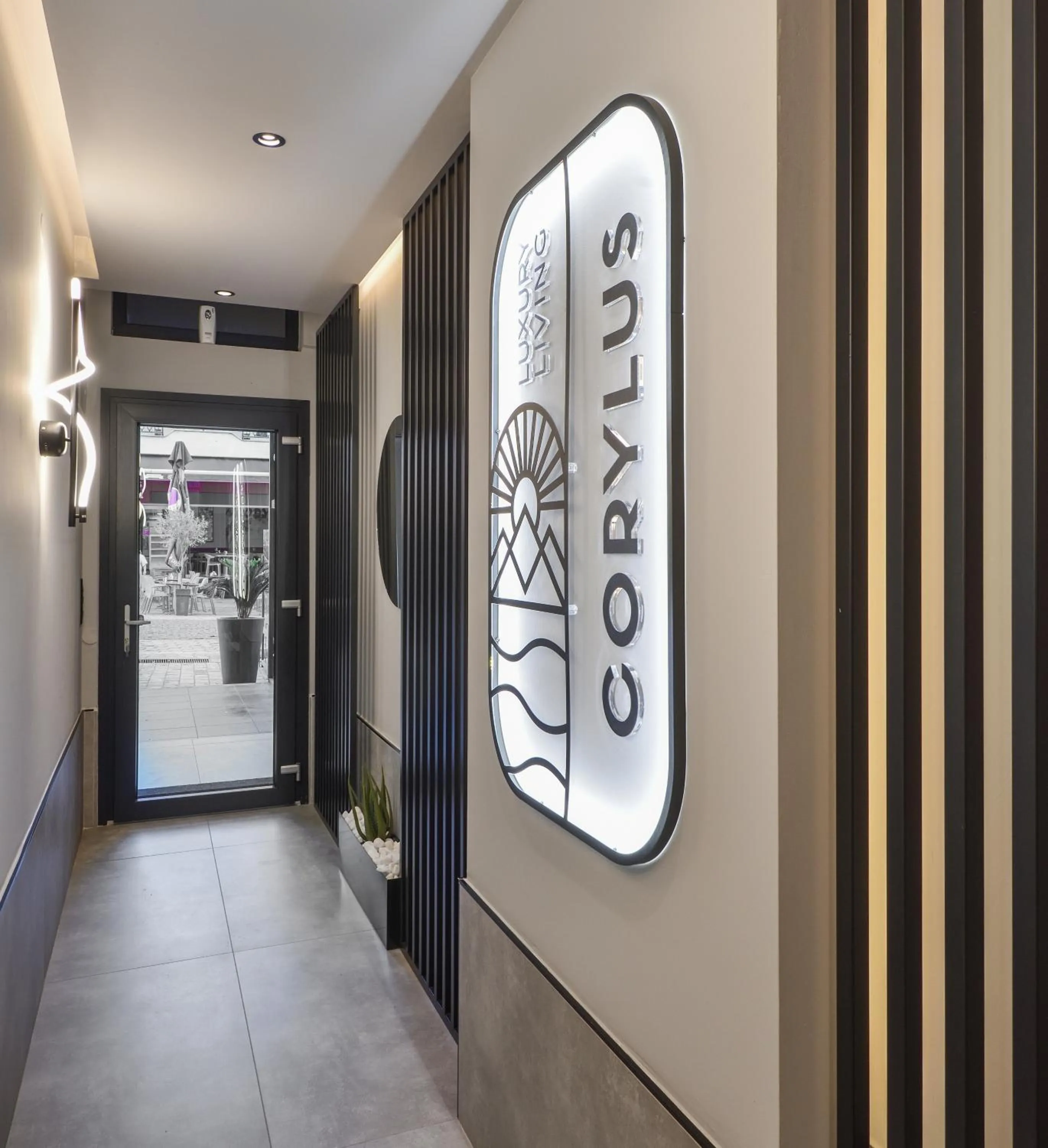 Logo/Certificate/Sign in CORYLUS Luxury Rooms & Suites