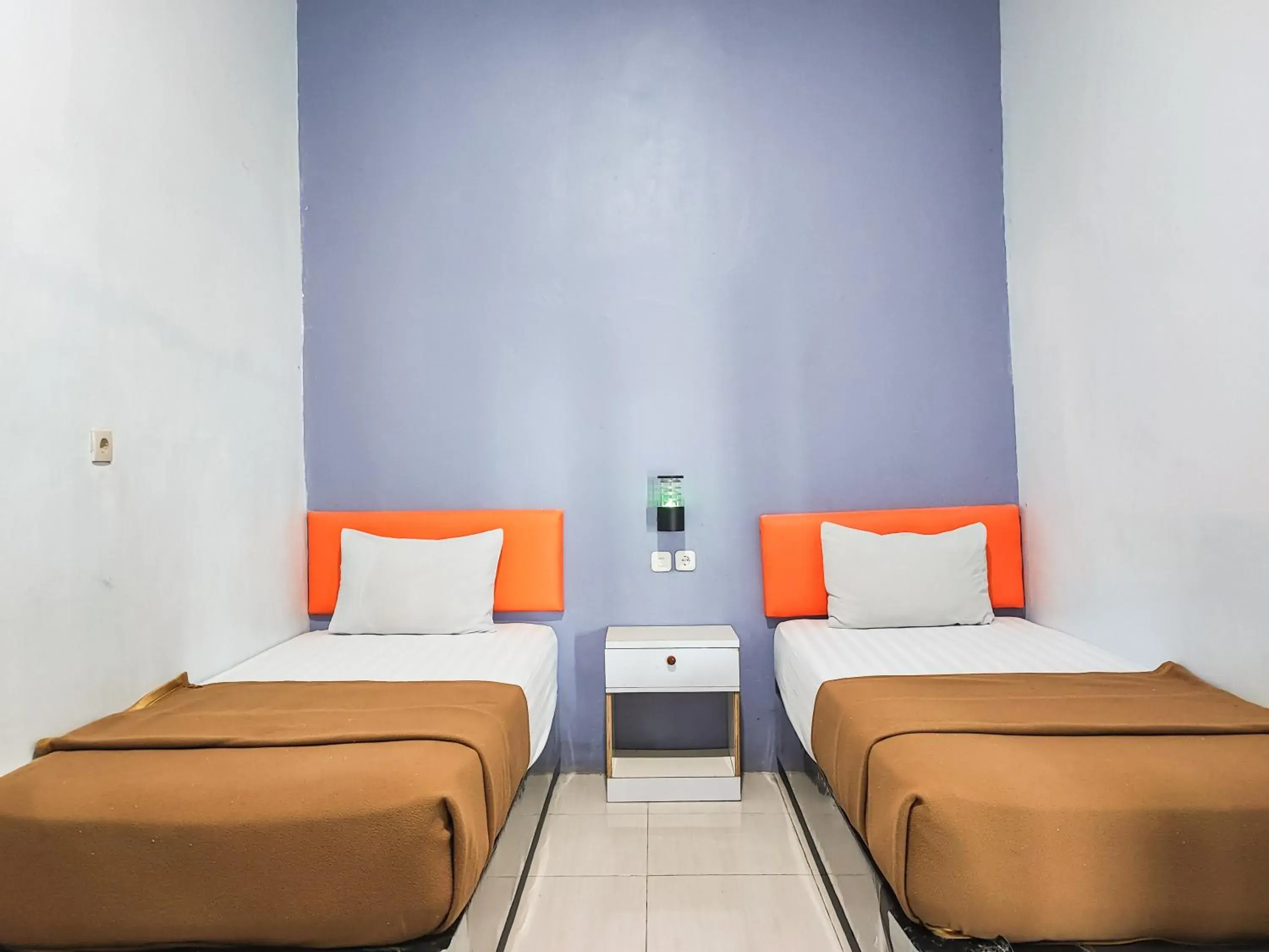 Bedroom, Bed in Reddoorz @ Hotel Bersaudara Bungo Bedroom, Bed in Reddoorz @ Hotel Bersaudara Bungo