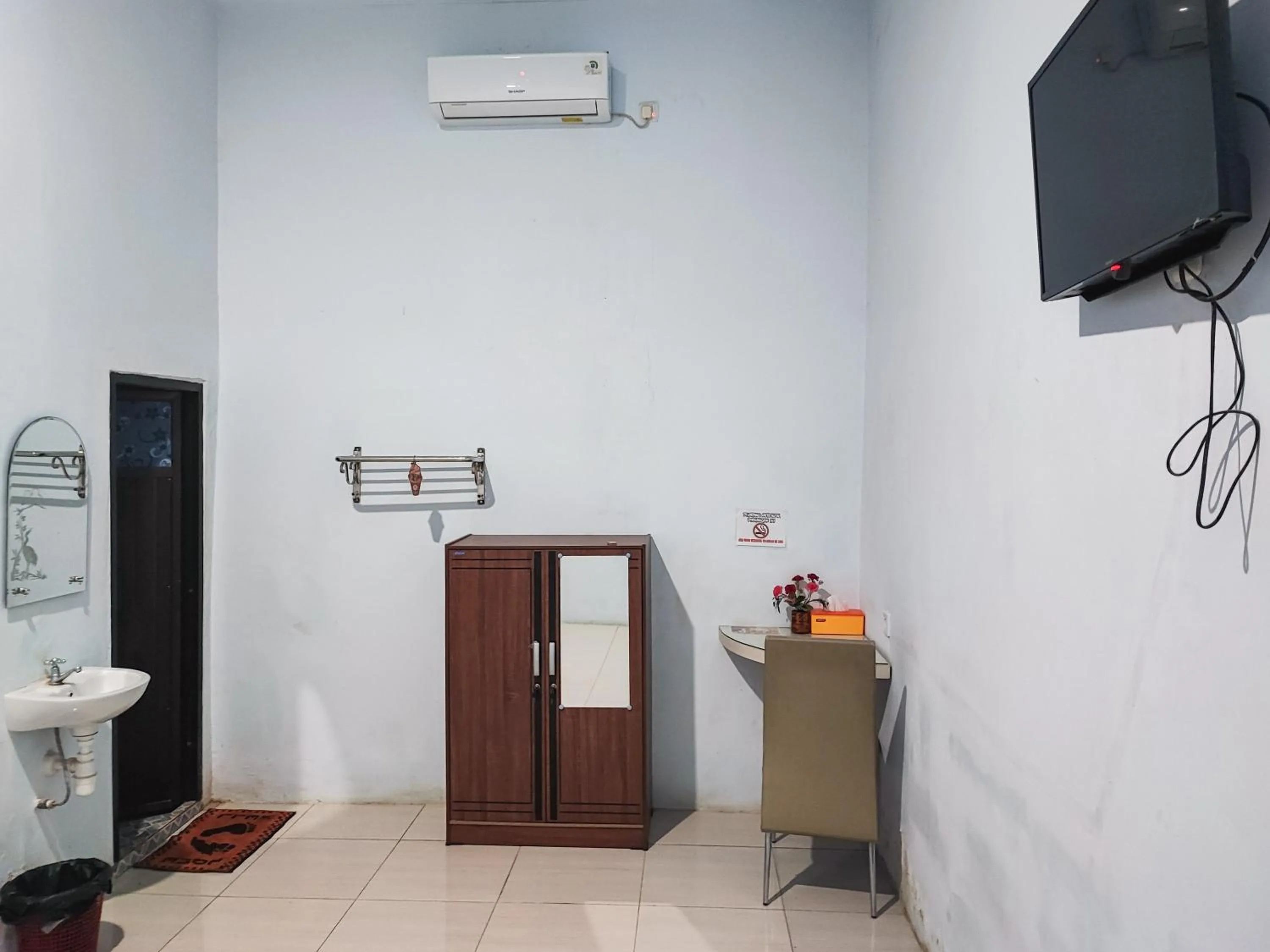 Bed in Reddoorz @ Hotel Bersaudara Bungo