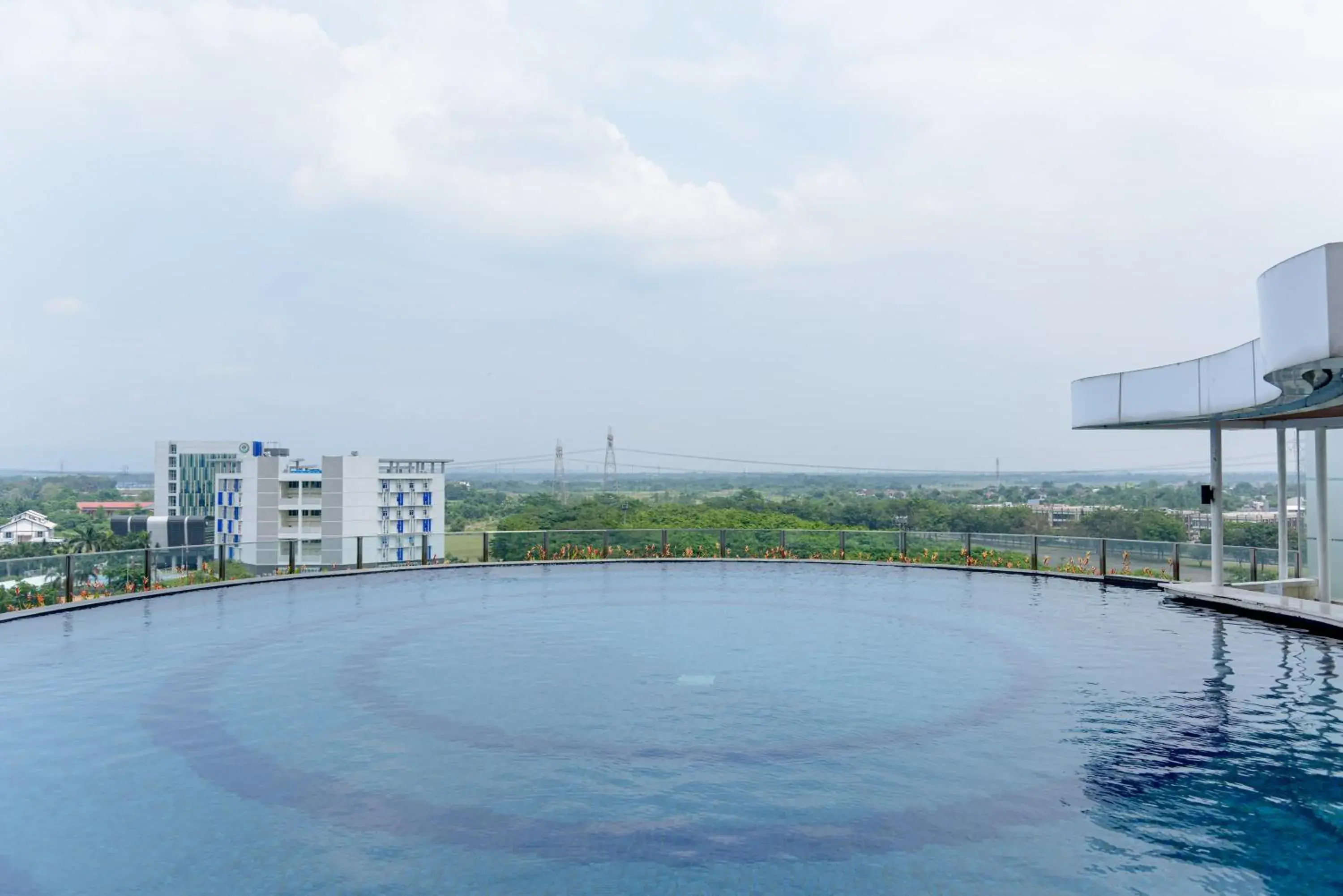 Swimming pool in RedLiving Apartemen B Residence BSD - BE Urban Hotel Swimming pool in RedLiving Apartemen B Residence BSD - BE Urban Hotel