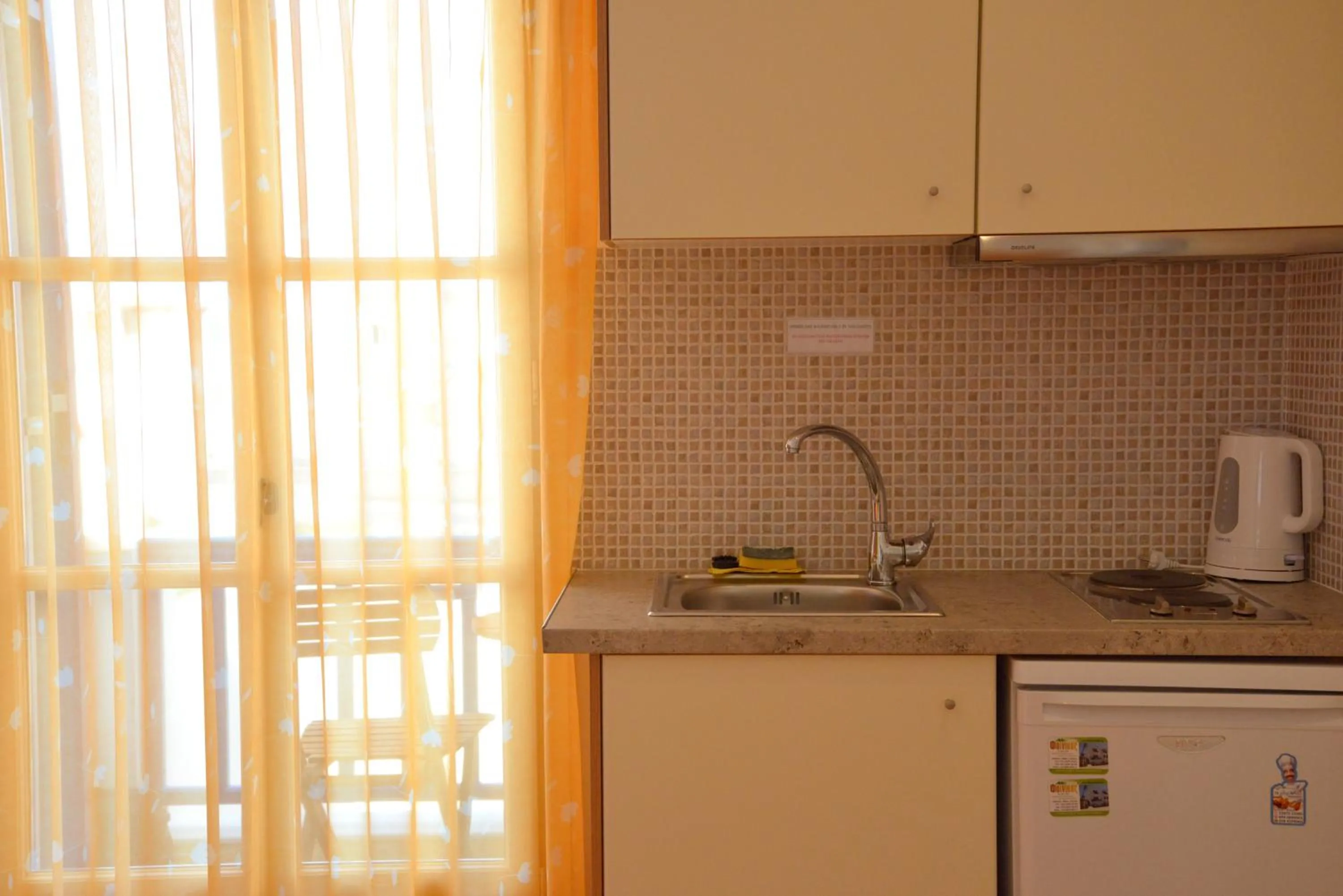 Kitchen or kitchenette in Finikas Studios