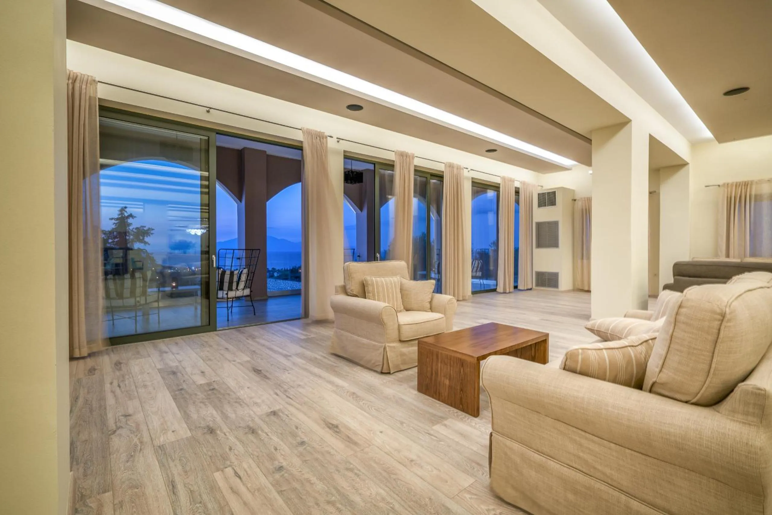 Communal lounge/ TV room in Elegance Luxury Executive Suites - Adults Only