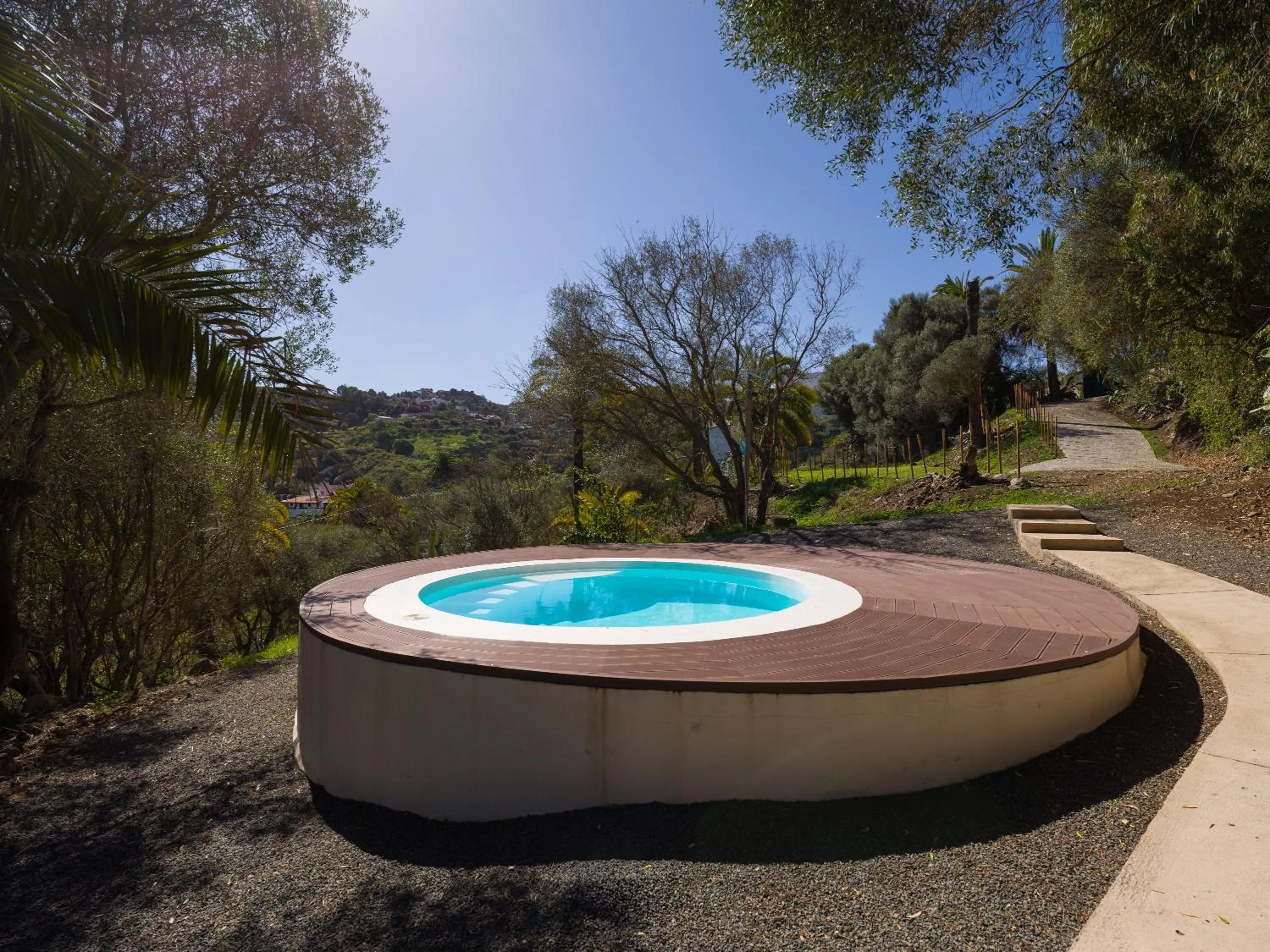 Swimming pool in Agroturismo Suites Hacienda los Olivos