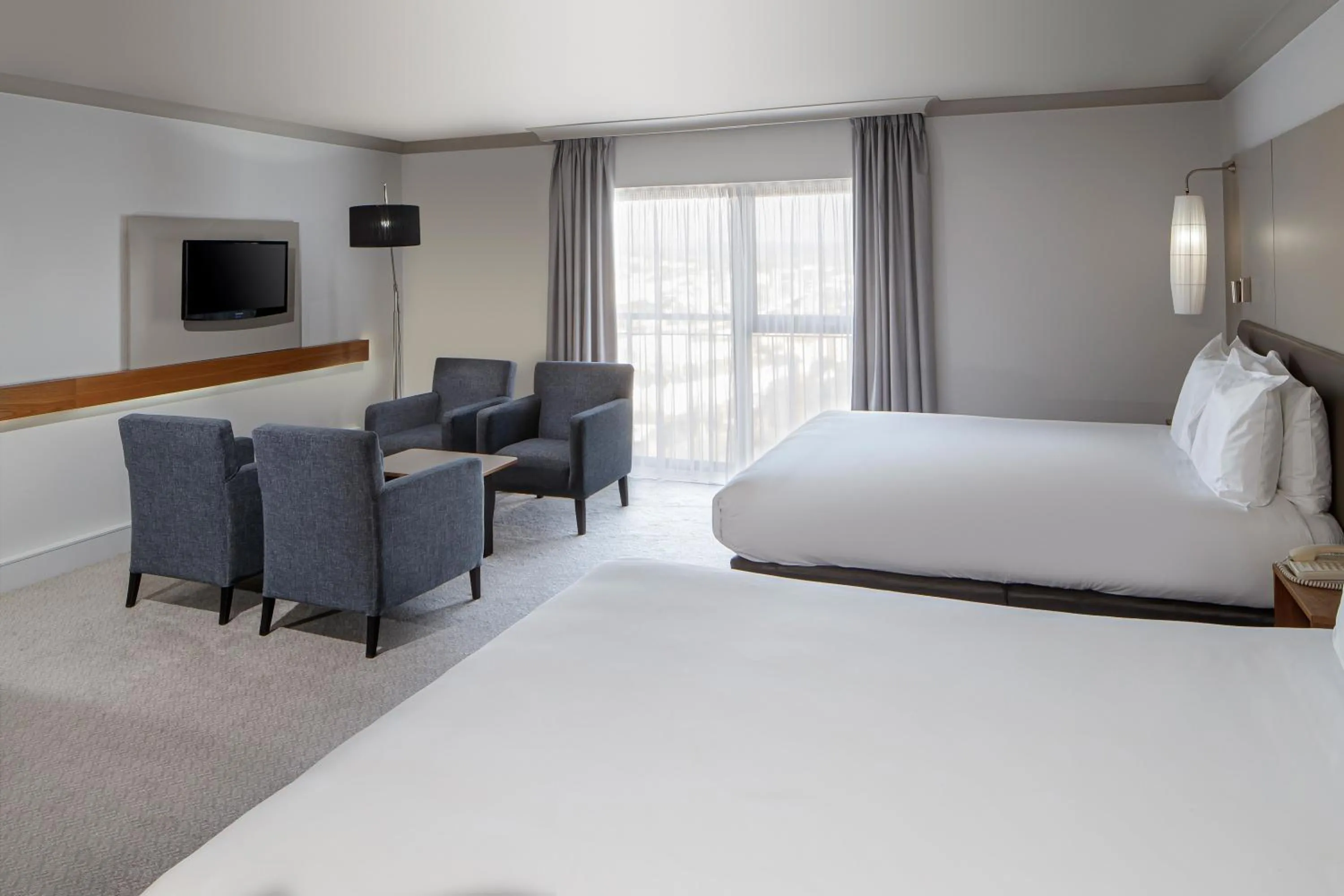 Seating area, Bed in Crowne Plaza Plymouth by IHG