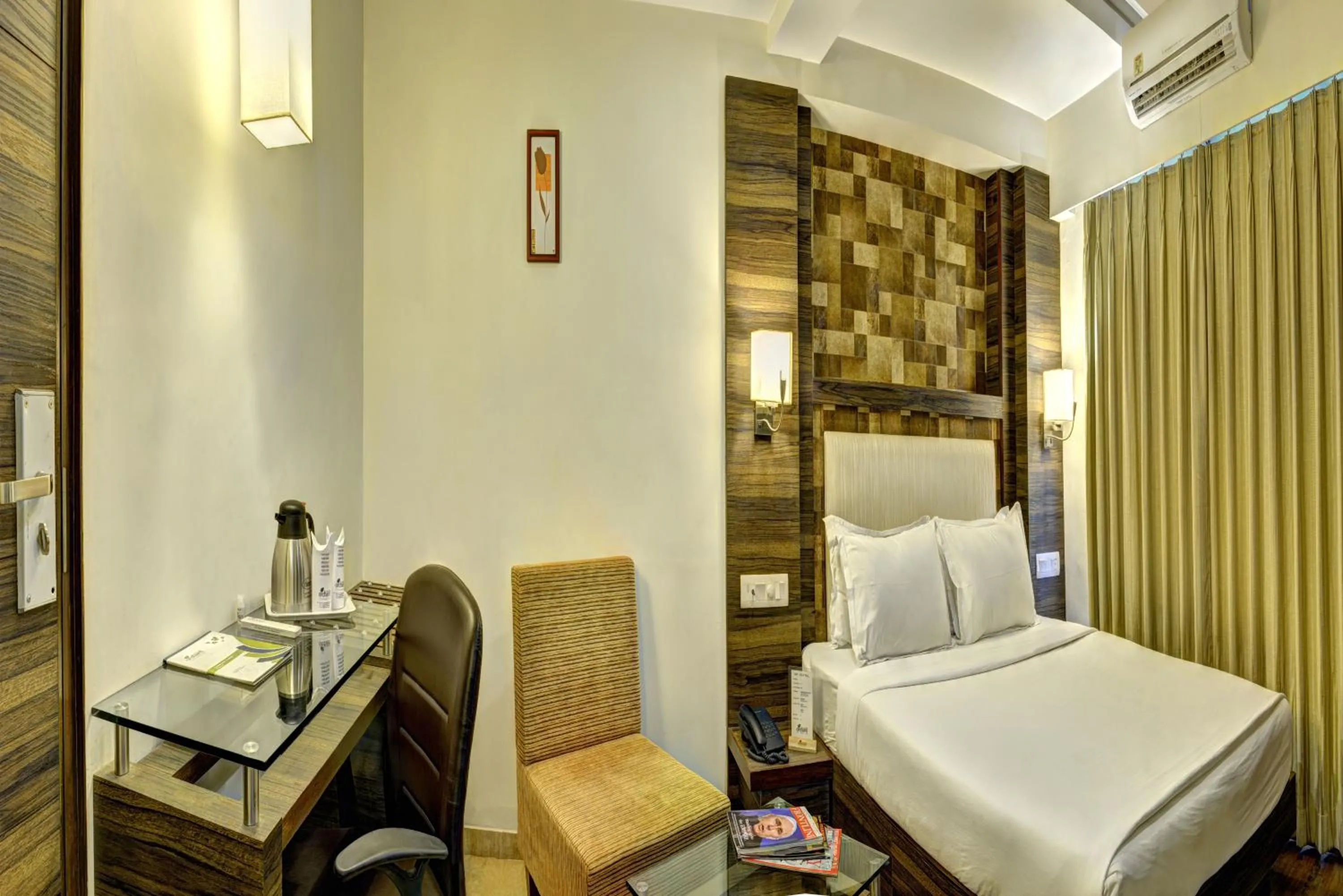 Bed in Hotel Aaram Orchard