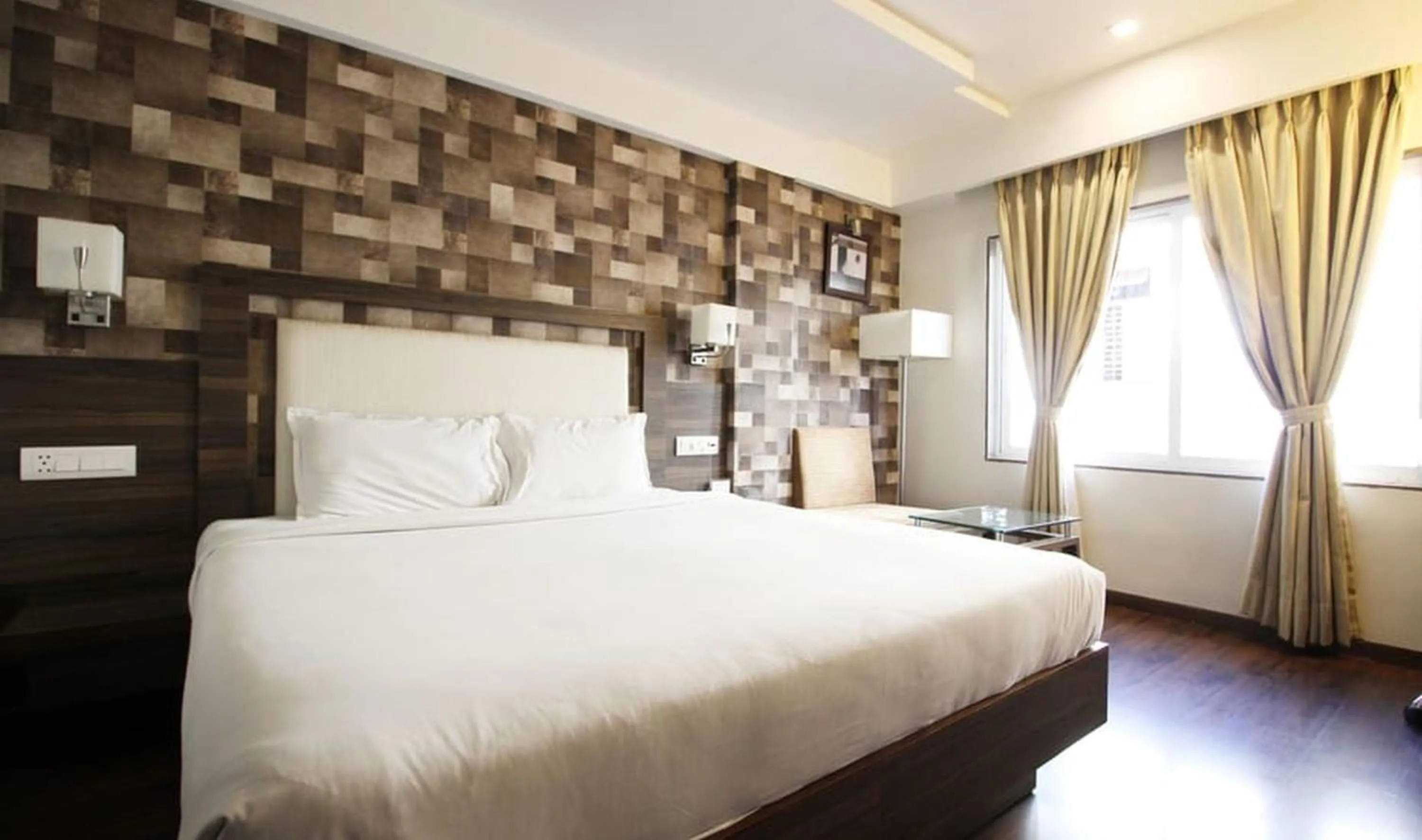 Bed in Hotel Aaram Orchard