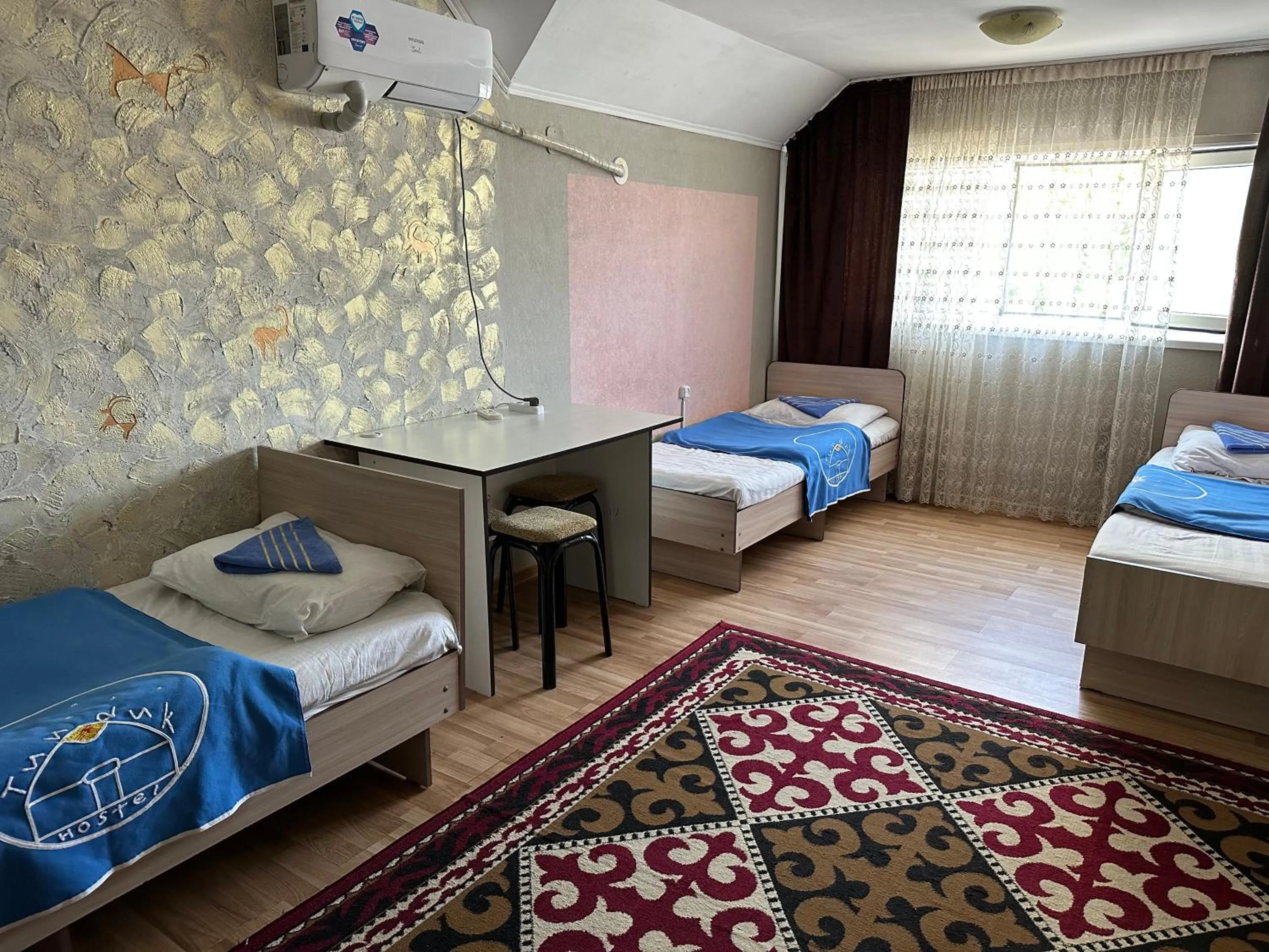 Standard Triple Room in Tunduk Hostel
