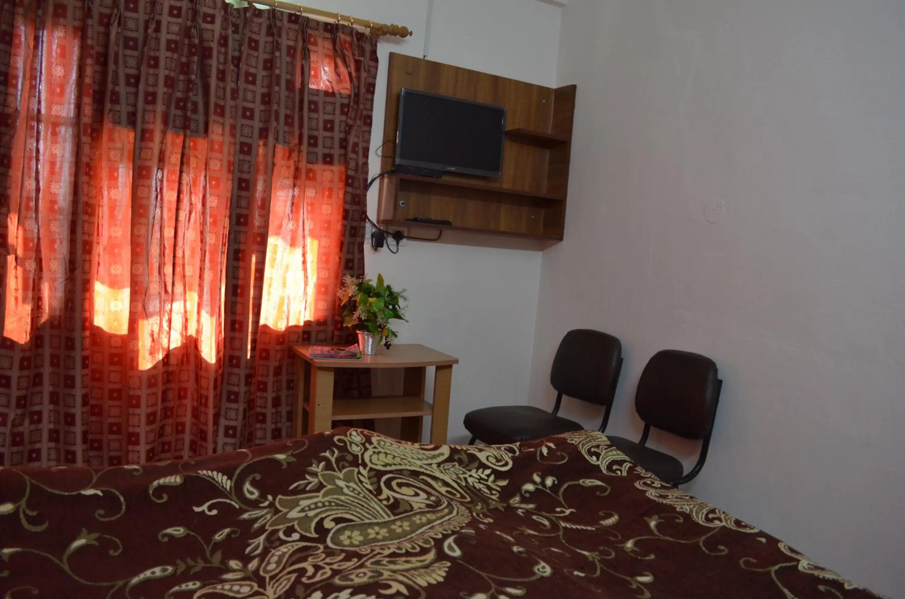 Bed in Hotel Centre Point Resorts Palampur