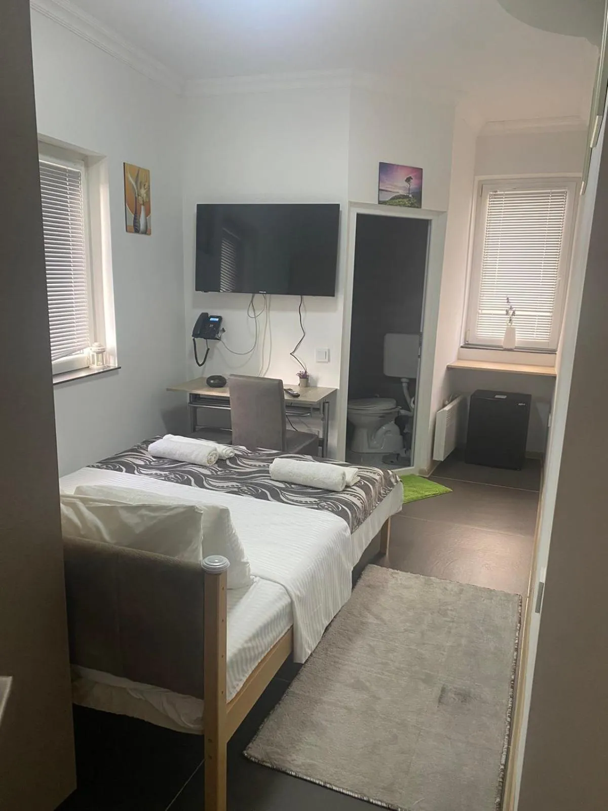 Bed in Hotel City Rooms Prishtina