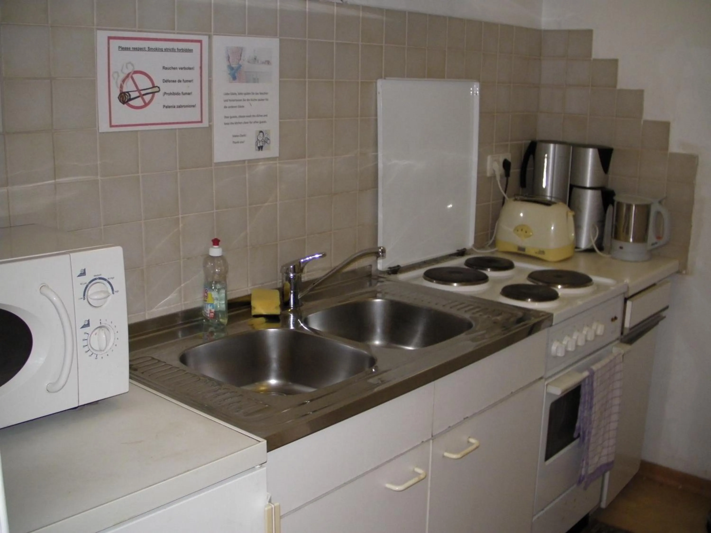 Kitchen or kitchenette in HappyHostel