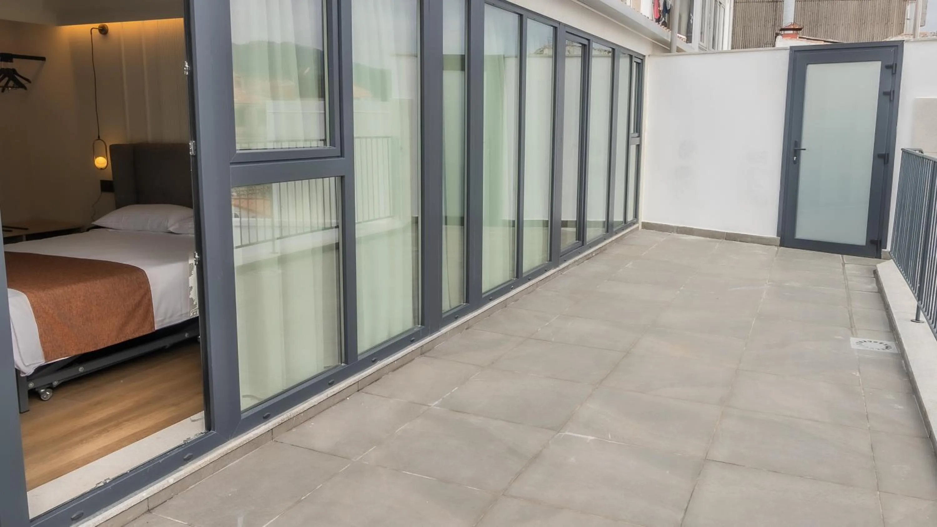 Balcony/Terrace, Bed in HOTEL CORONA DE PADRÓN