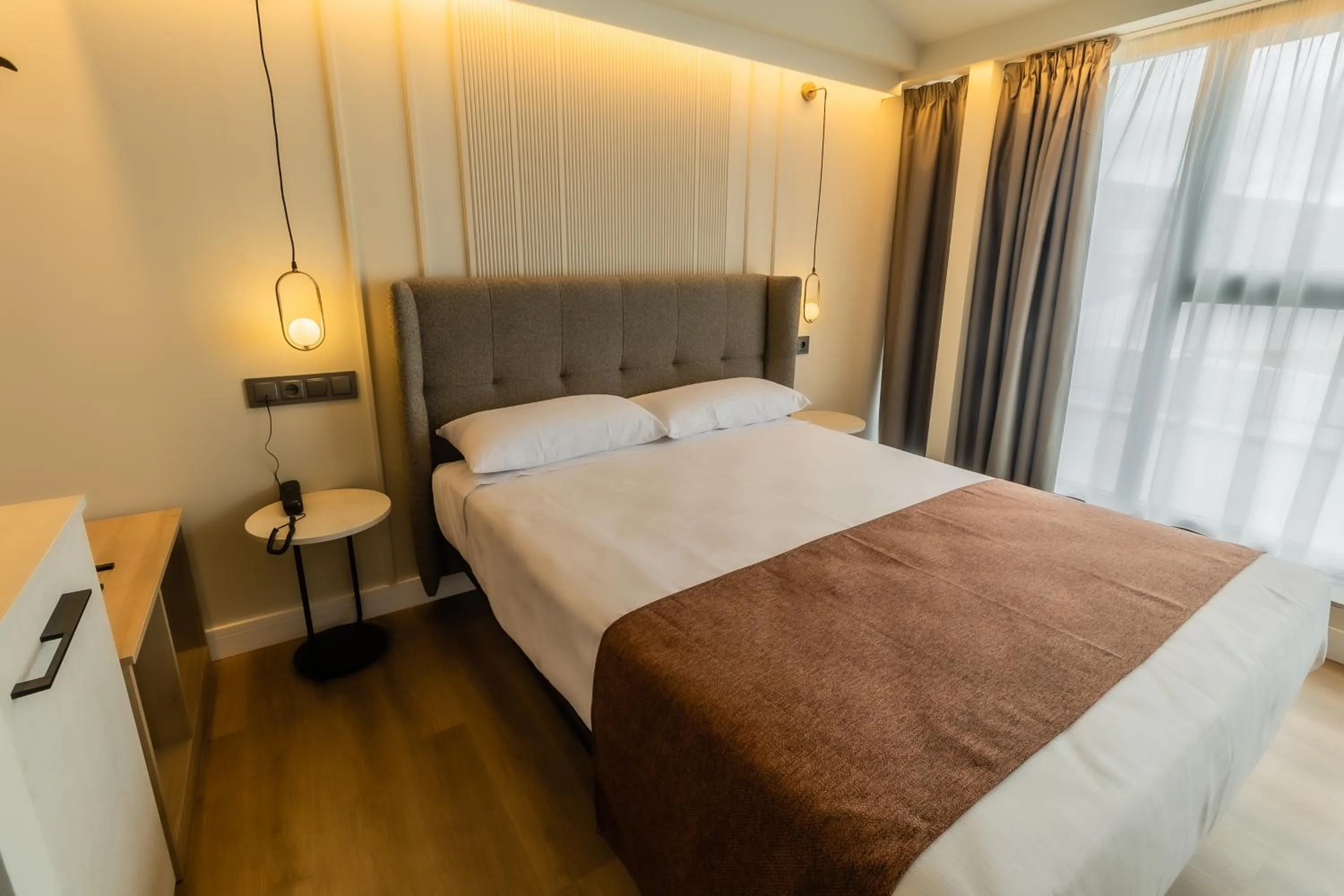 Bed in HOTEL CORONA DE PADRÓN